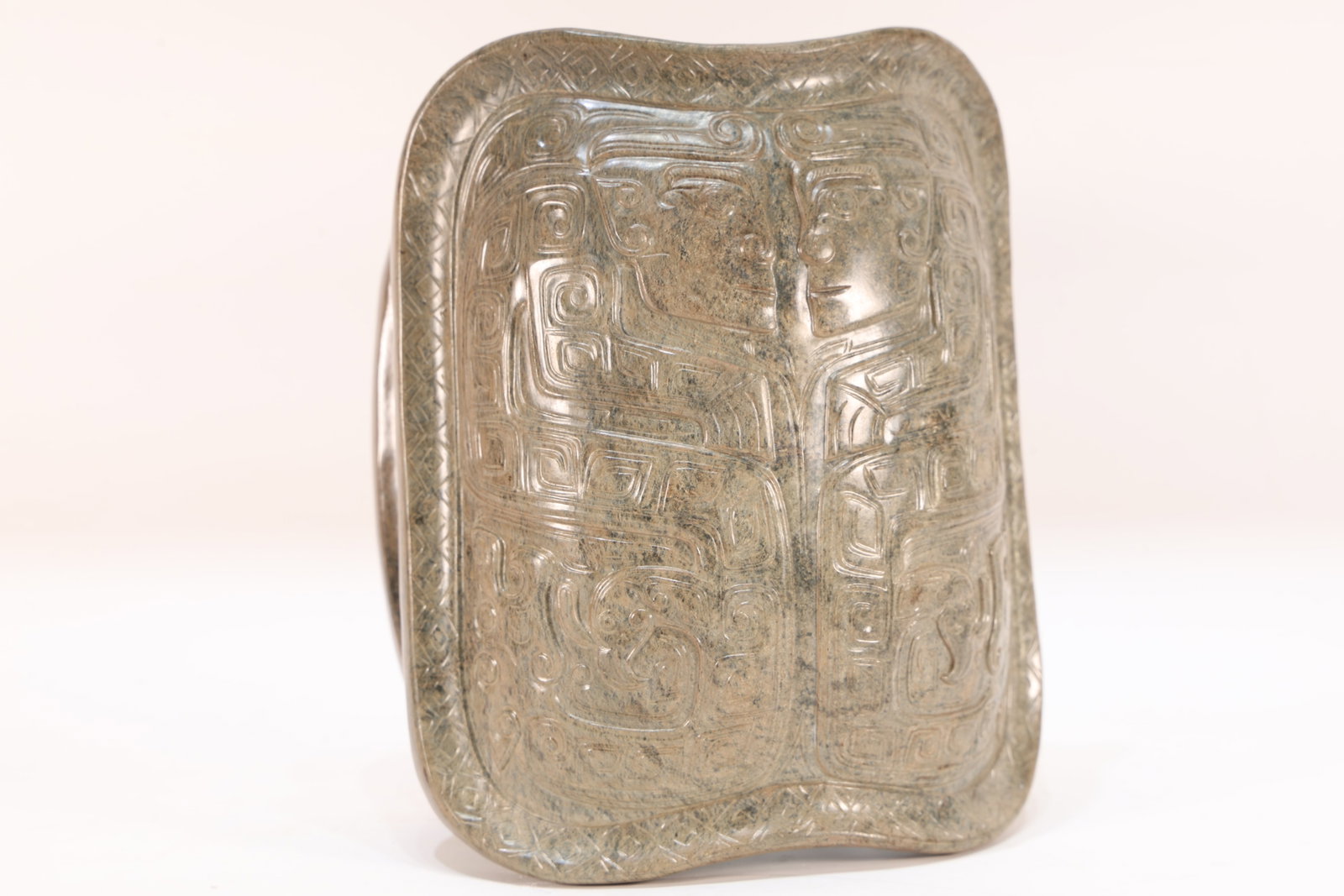 A Jade Carved Beast Face Pattern Turtle Shell: A Jade Carved Beast Face Pattern Turtle Shell (17 x 9.5 x 13.5cm)