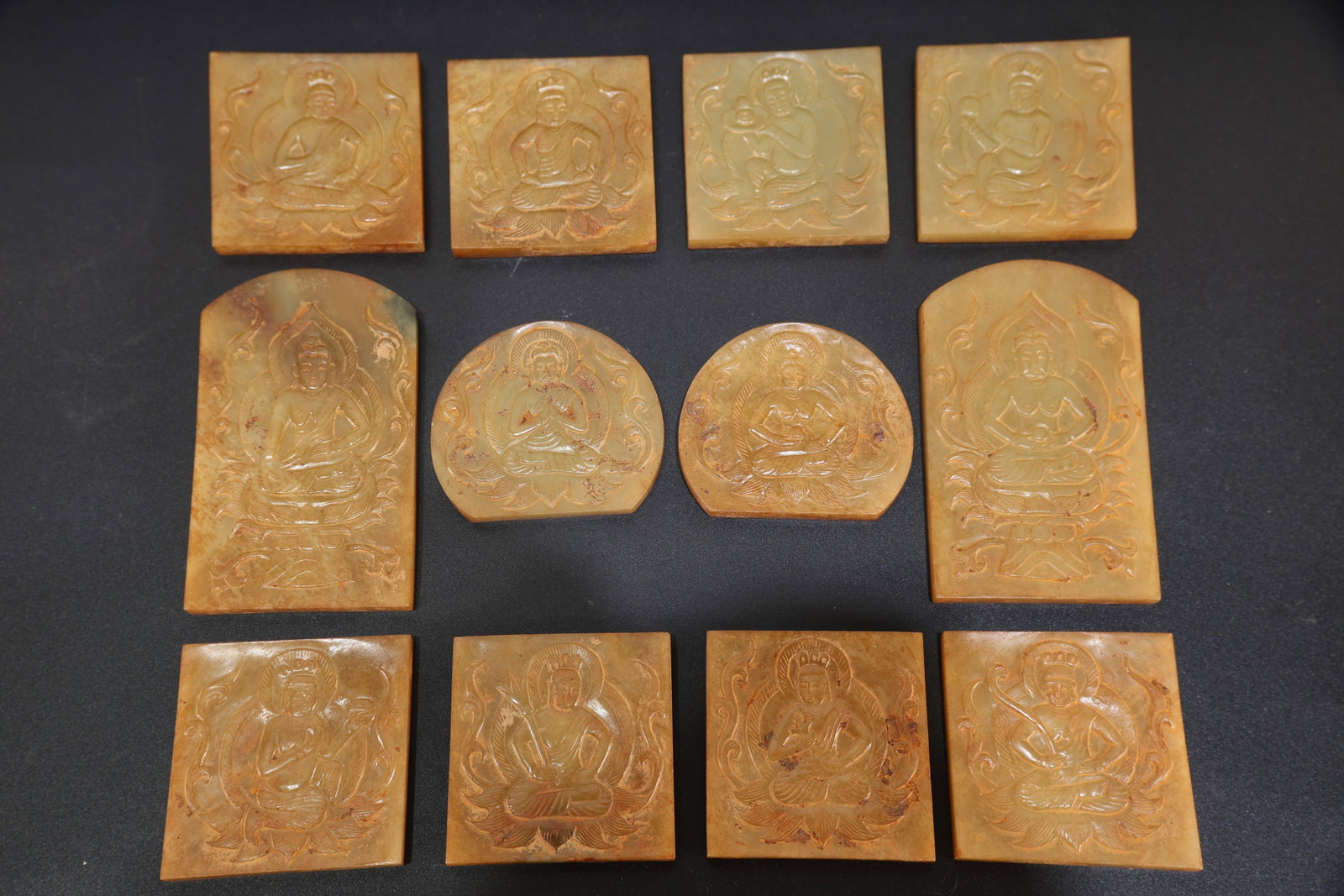 Group of Twelve Jade Carved Buddha Pattern Waistband: Group of Twelve Jade Carved Buddha Pattern Waistband (8 x 4.8 x 0.6cm,5.5 x 4.5 x 0.6)