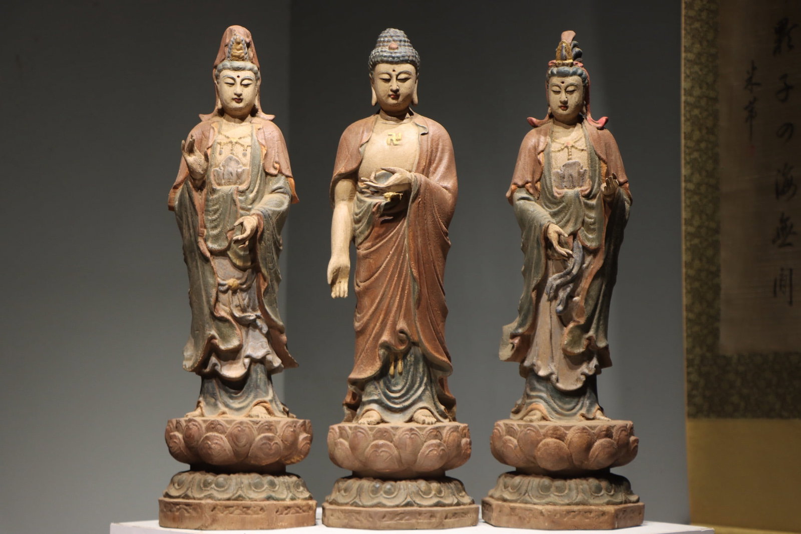 Group of Three Wood Colour Painted Amitabha and Mahasthamaprapta & Avalokitesvara Figure: Group of Three Wood Colour Painted Amitabha and Mahasthamaprapta & Avalokitesvara Figure (71cm)