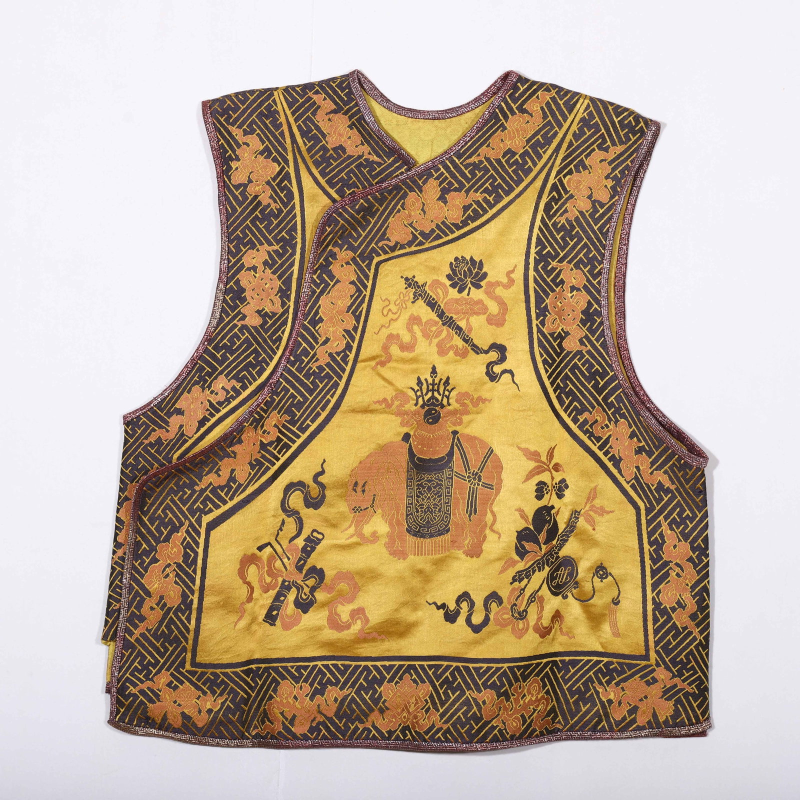 A CHINESE BROCADE VEST: A CHINESE BROCADE VEST (64 x 58cm)