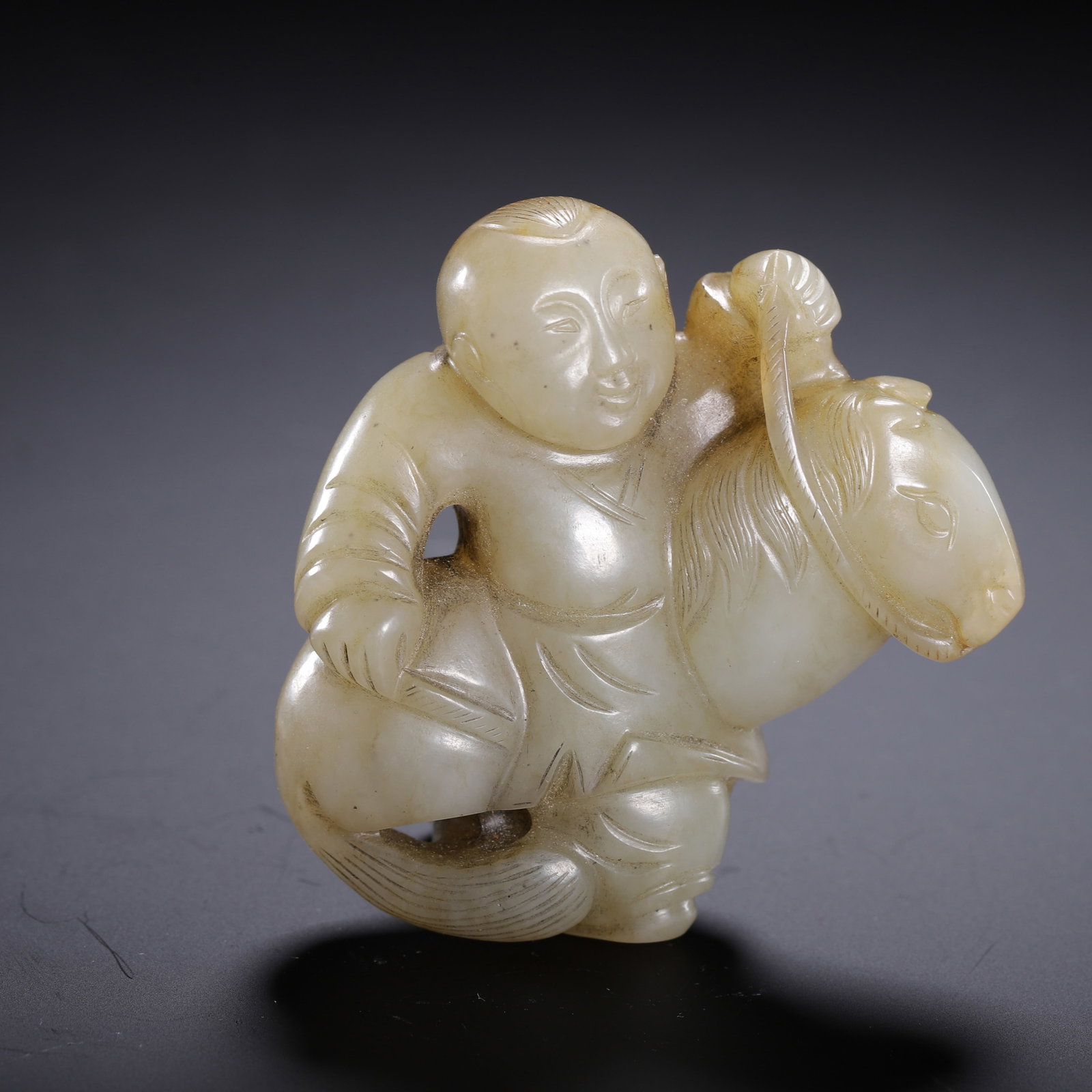 A Chinese Hetian Jade Boy with Hobby Horse Pendant: A Chinese Hetian Jade Boy with Hobby Horse Pendant (6.5 x 2 x 6.5cm,Weight 110g)
