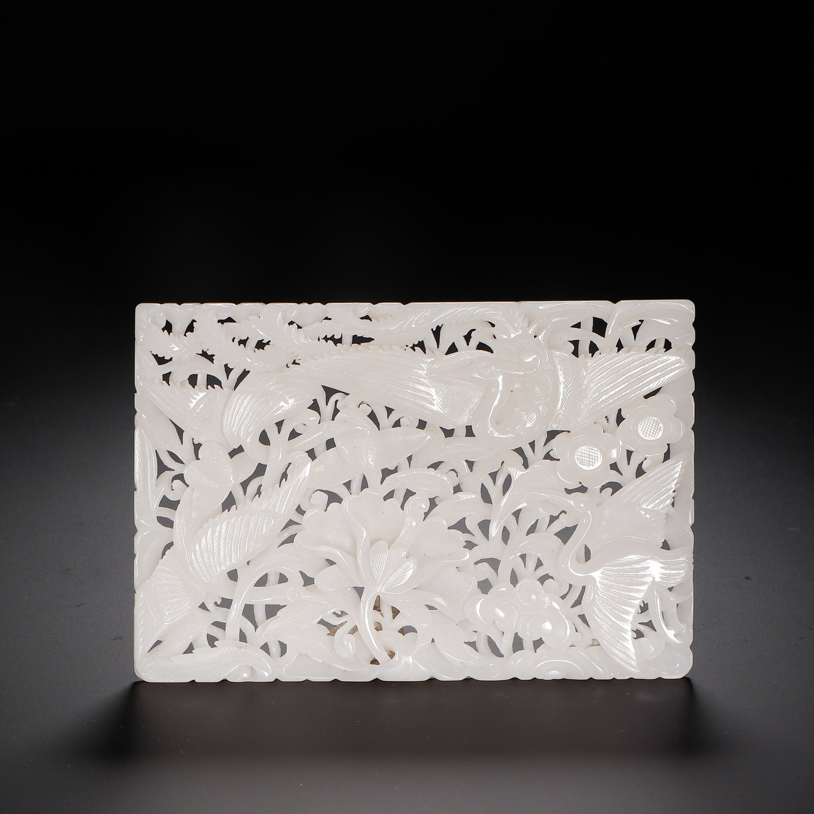 A Chinese White Jade Reticulated Plaque: A Chinese White Jade Reticulated Plaque (12 x 8cm)