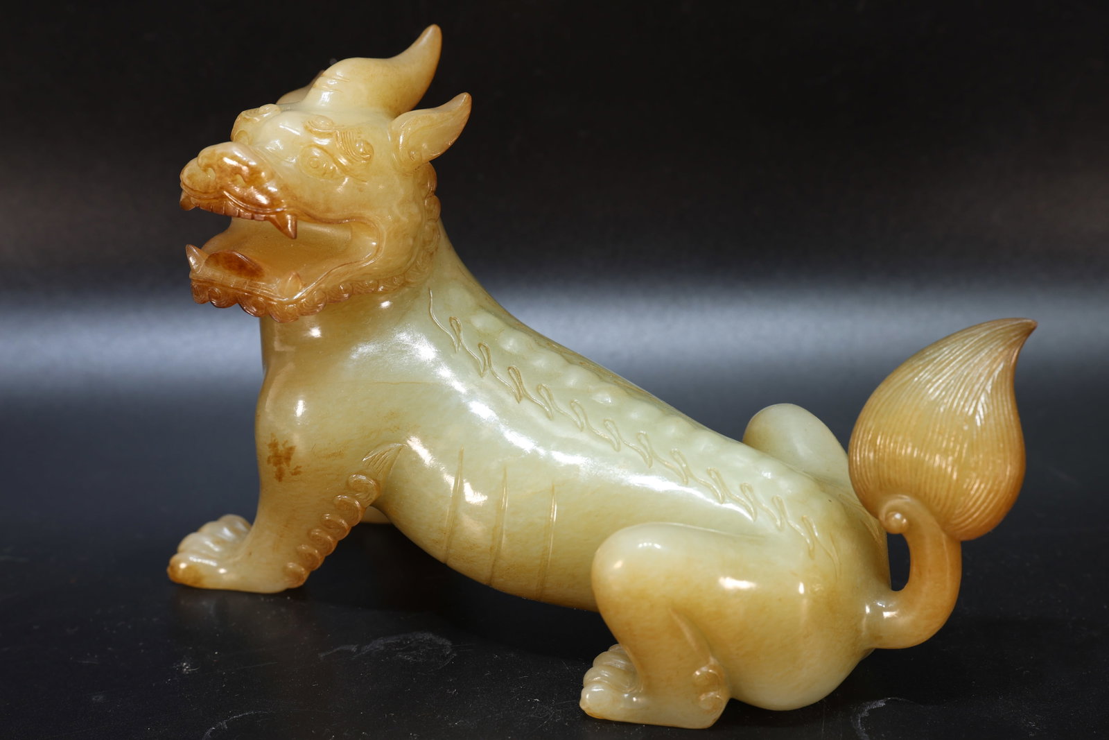 A Jade Carved Beast Shape Figure: A Jade Carved Beast Shape Figure (11 x 17 x 7.5cm)