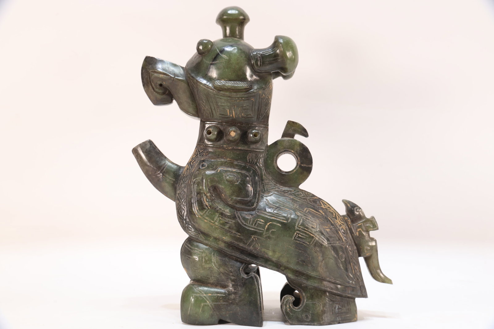 A Jade Carved Beast Face Pattern Bird Shape Figure (1 of 10)