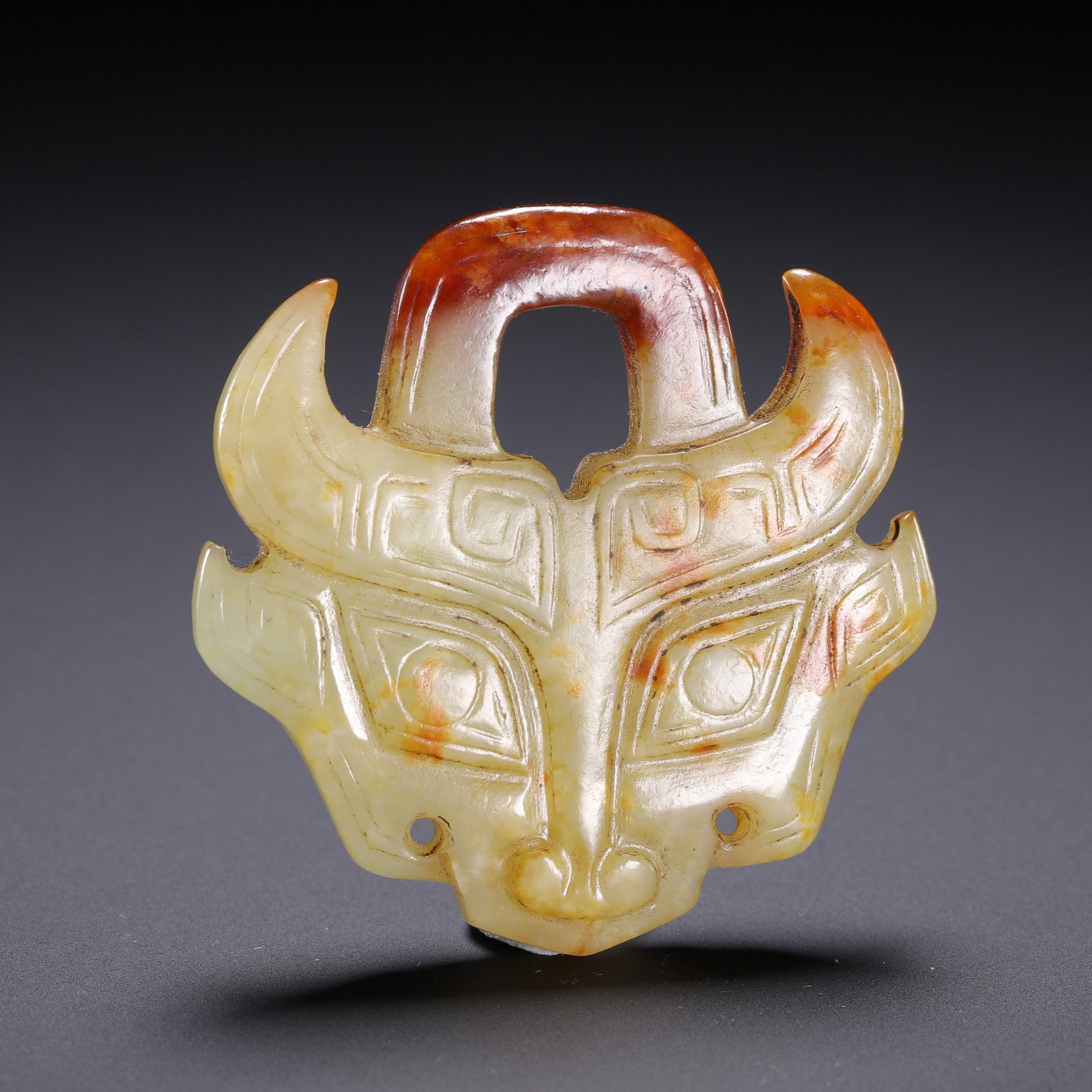A Chinese Yellow Jade Taotie Pendant: A Chinese Yellow Jade Taotie Pendant (5.5 x 5cm)
