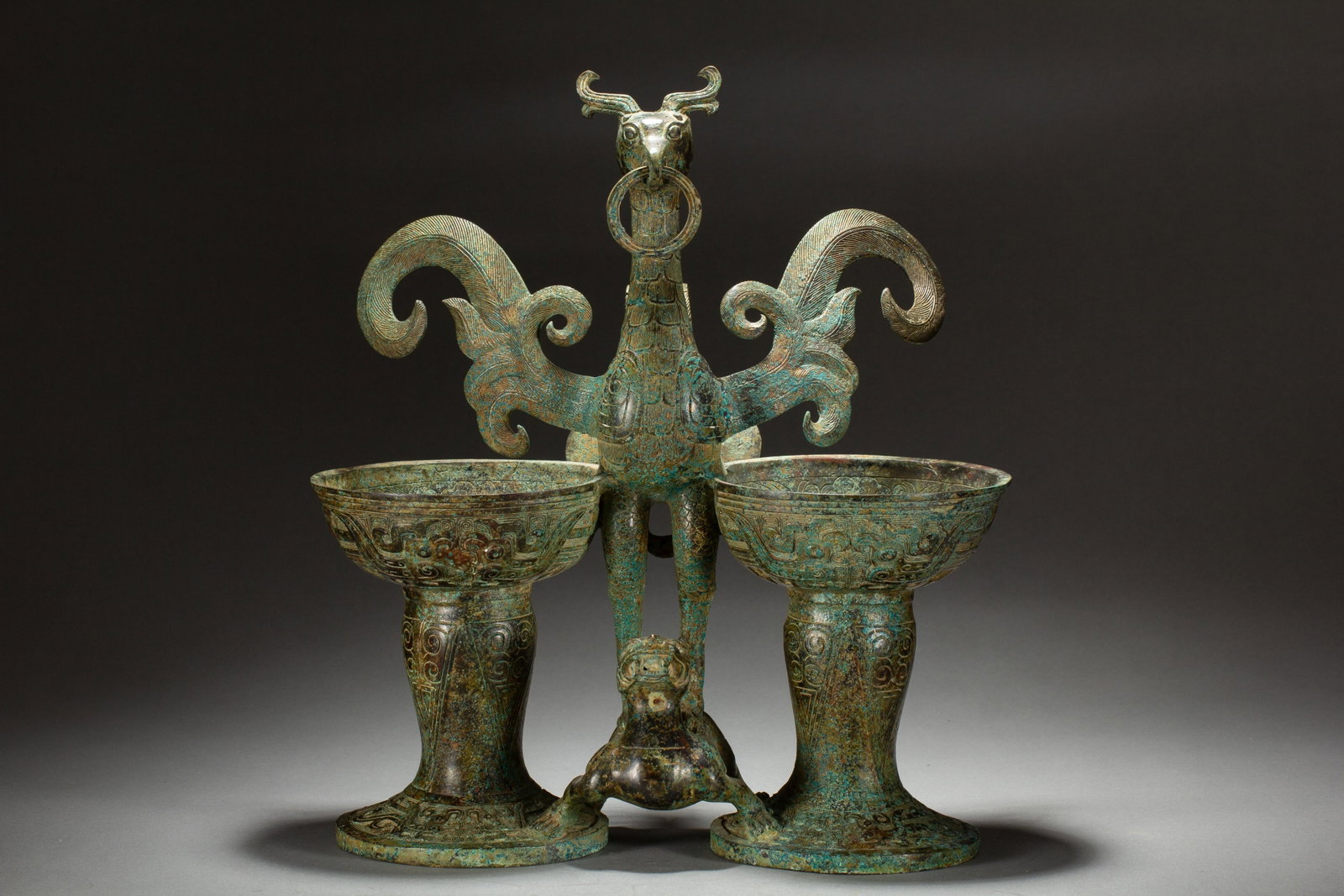 A Chinese Archaic Bronze Phoenix Vessel: A Chinese Archaic Bronze Phoenix Vessel (30 x 15 x 37cm,Weight 5730g)