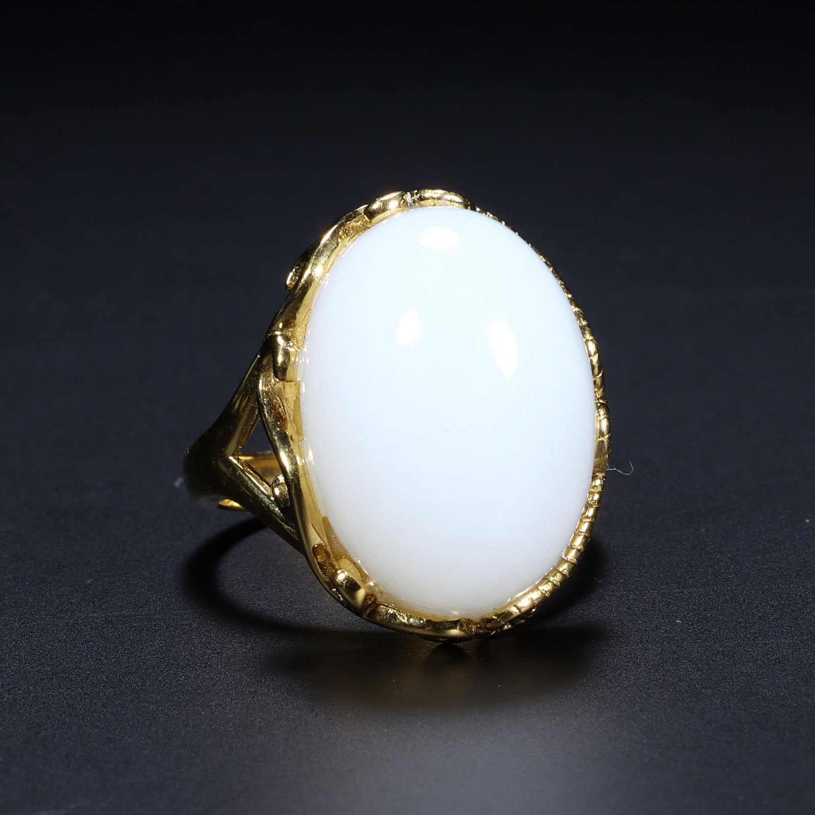 A Chinese Hetian White Jade Ring: A Chinese Hetian White Jade Ring (2.1 x 1.4cm)