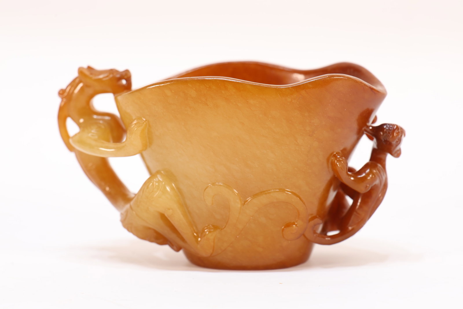 A Jade Carved Double Chi Dragon Ears Cup: A Jade Carved Double Chi Dragon Ears Cup (10 x 5.5 x 5cm)