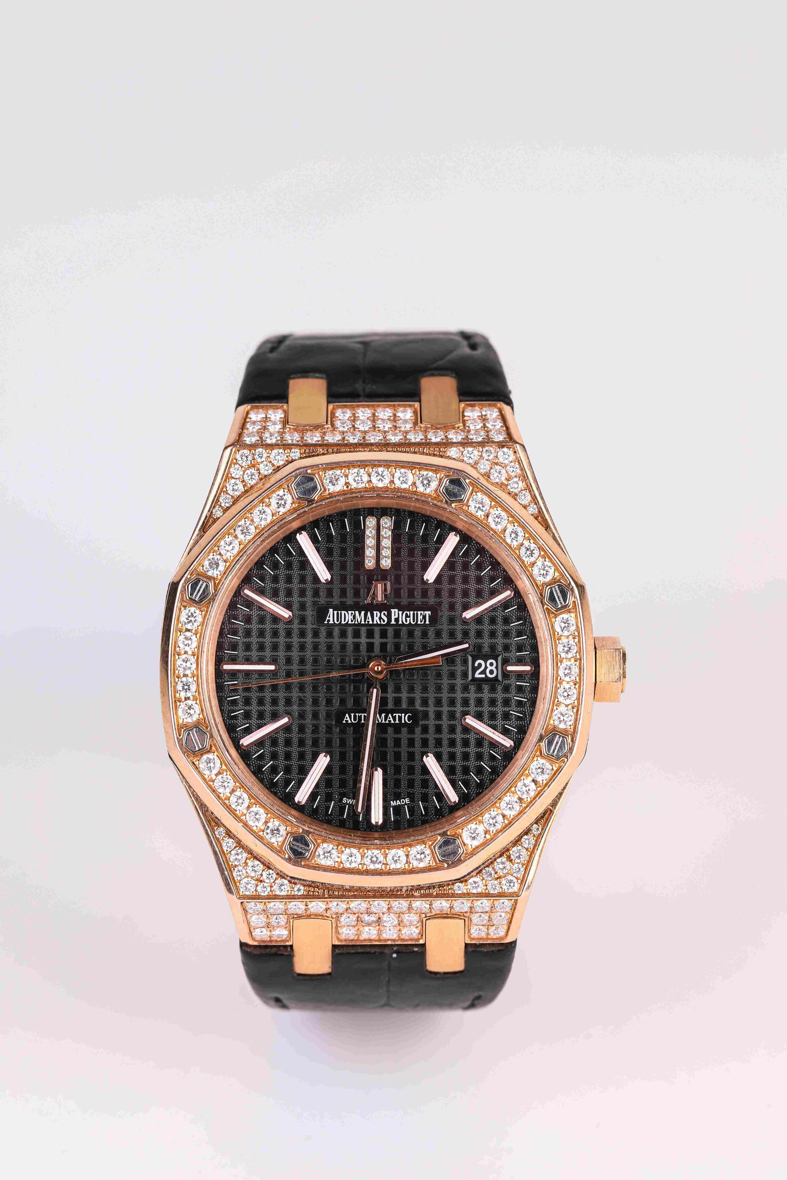 An Audemars Piguet Gold and Diamond Mechanical Wristwatch: Dimensions: Width: 44 mm. All measurements are approximate.