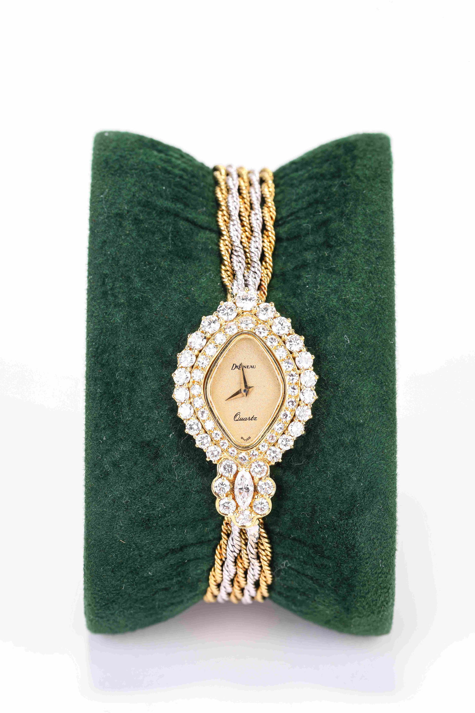 A Delaneau Gold and Diamond Wristwatch: Dimensions: Width: 21 mm x Height: 34 mm. All measurements are approximate.