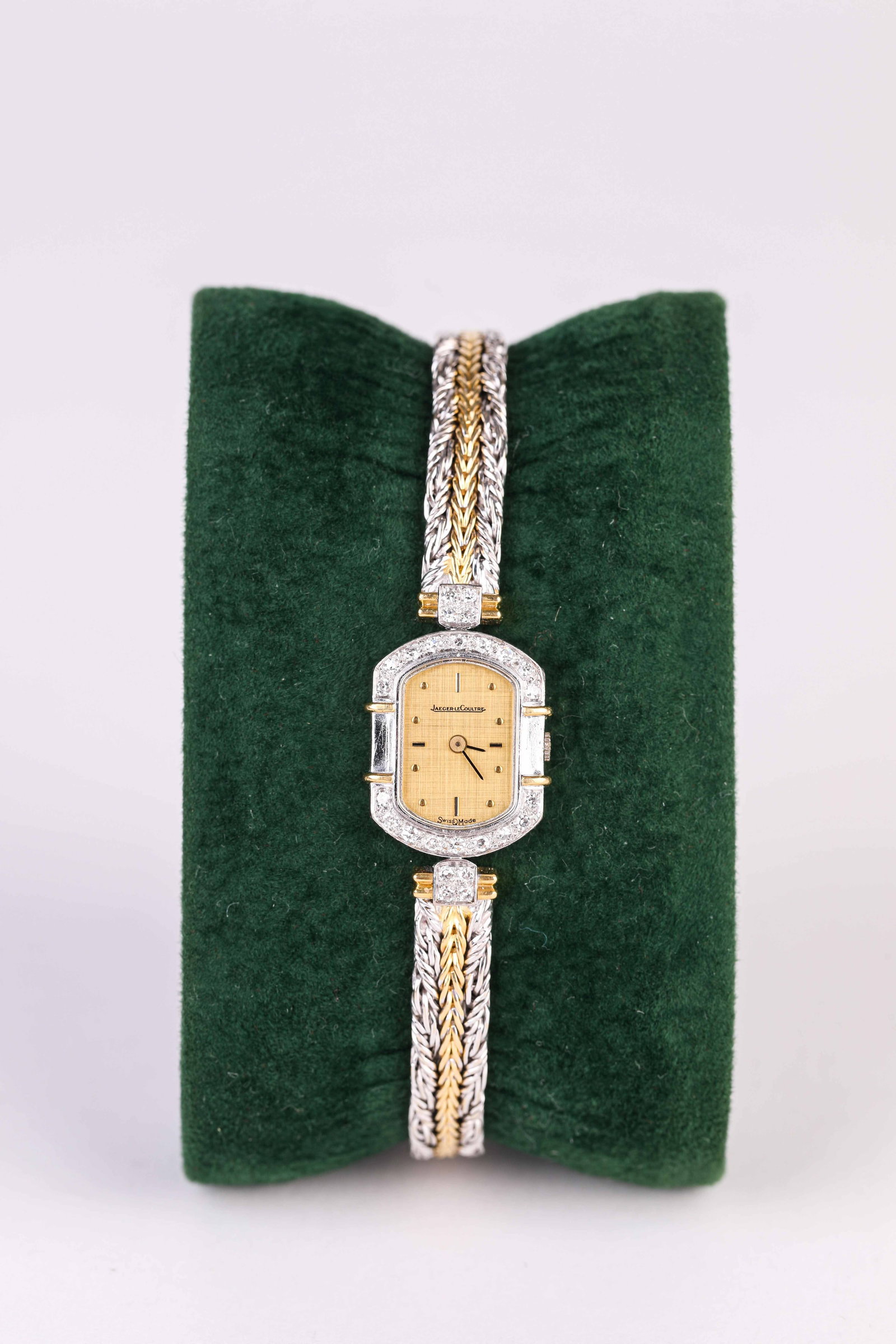 A Jaeger-LeCoultre Gold and Diamond Wristwatch: Dimensions: Width: 15 mm x Height: 18 mm. All measurements are approximate.