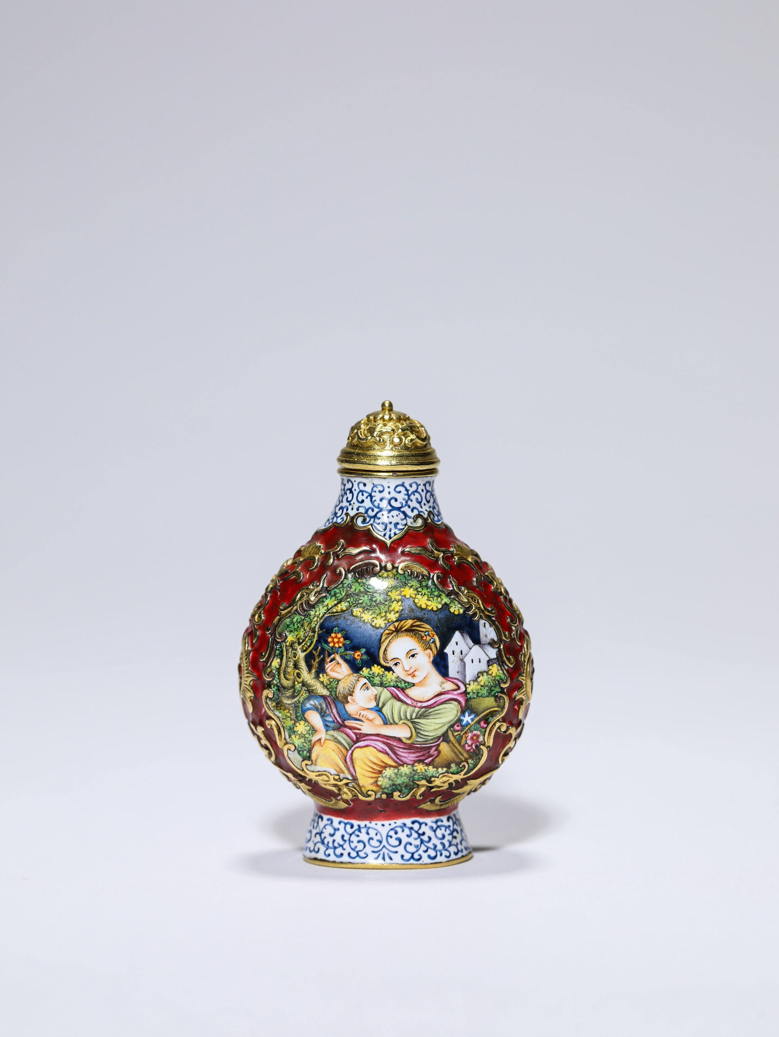 A Copper Painted Enamel 'Figural' Snuff Bottle: Dimensions: Weight: 43 g. Length: 3.8 cm x Width: 2.4 cm x Height: 5.9 cm. All measurements are approximate.
