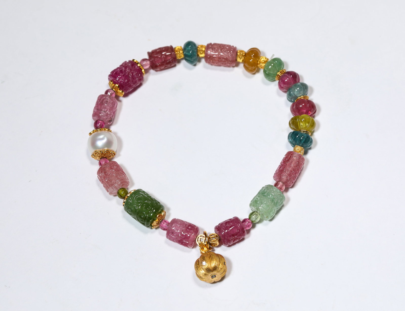 A Tourmaline Bracelet: Dimensions: Length: 8.8 cm. All measurements are approximate.