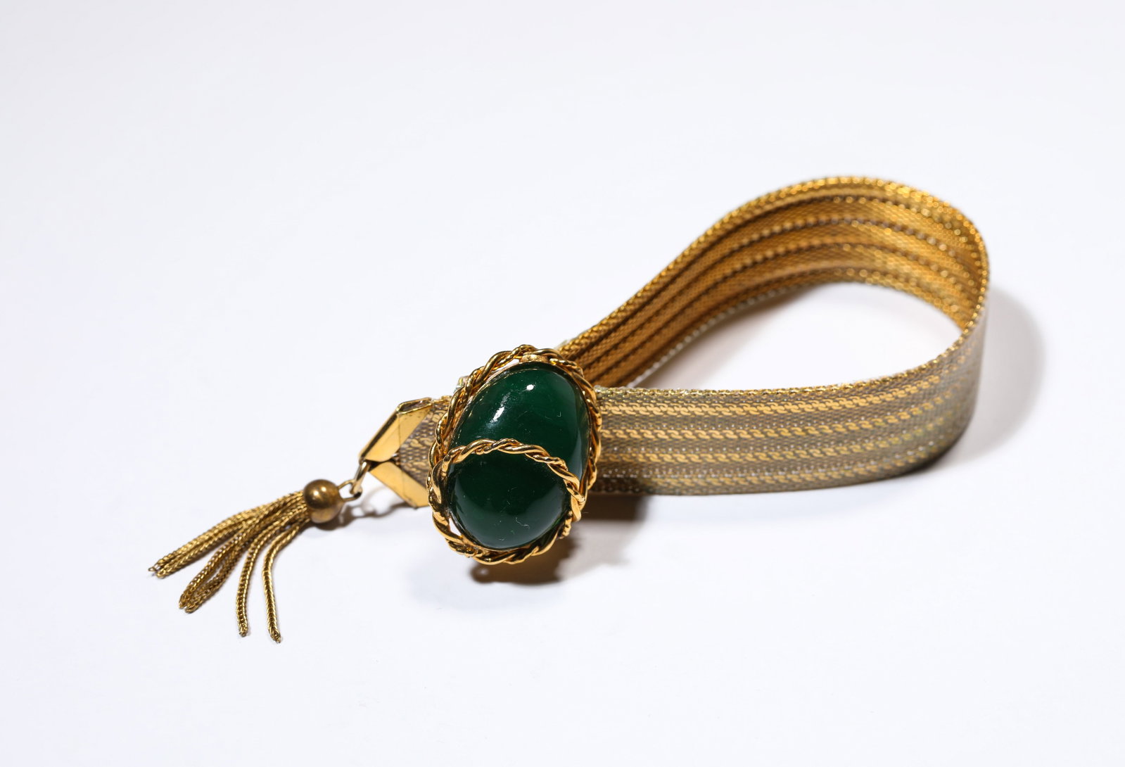 A Gemstone Bracelet: Dimensions: Weight: 32 g. Length: 21 cm x Width: 3 cm. All measurements are approximate.