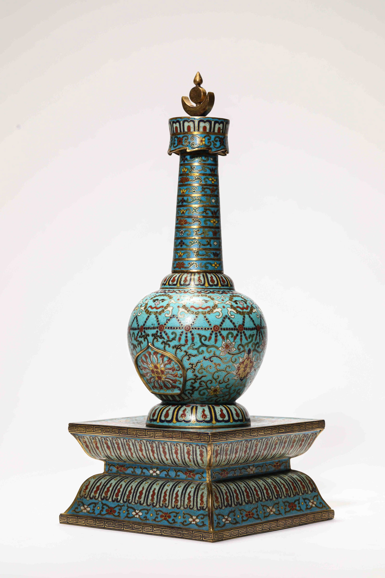 A Cloisonn? Enamel 'Floral' Stupa: Dimensions: Weight: 2174 g. Width: 14.6 cm x Height: 32.8 cm. All measurements are approximate.