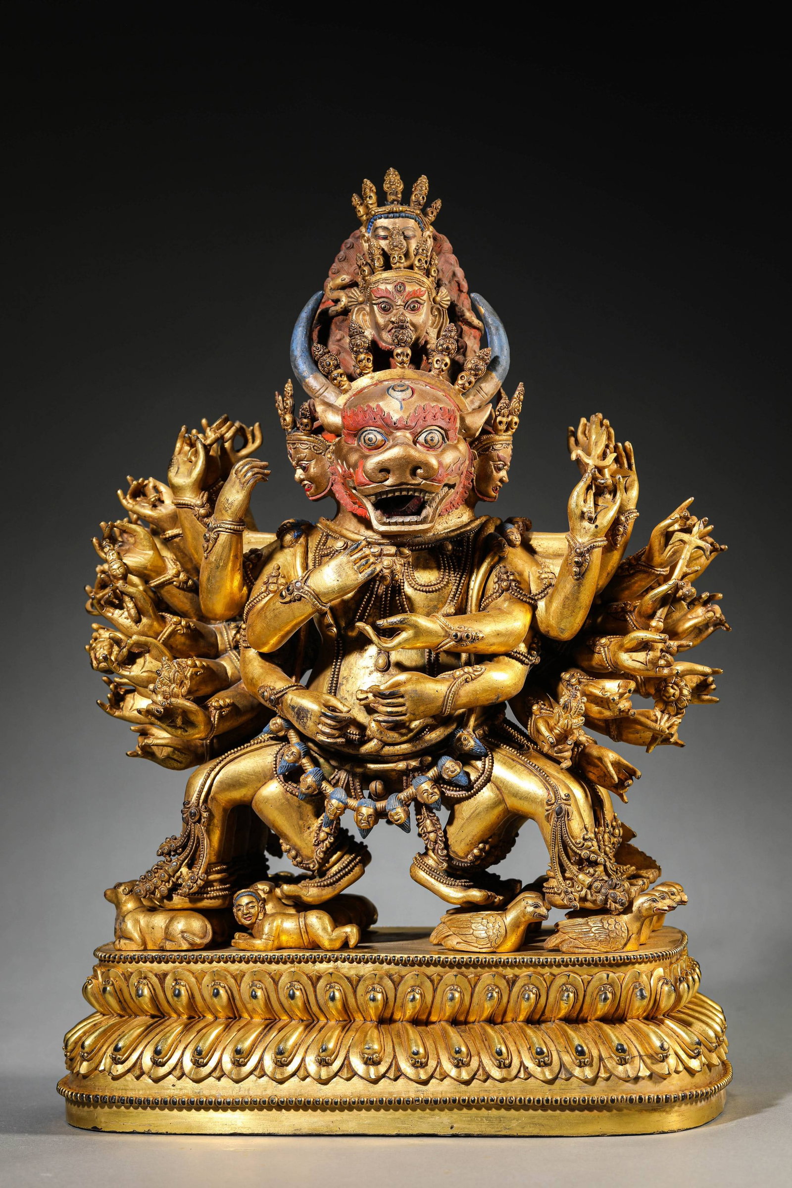 A Gilt-Bronze Figure of Yamantaka: Dimensions: Weight: 12100 g. Length: 26 cm x Width: 15 cm x Height: 39 cm. All measurements are approximate.