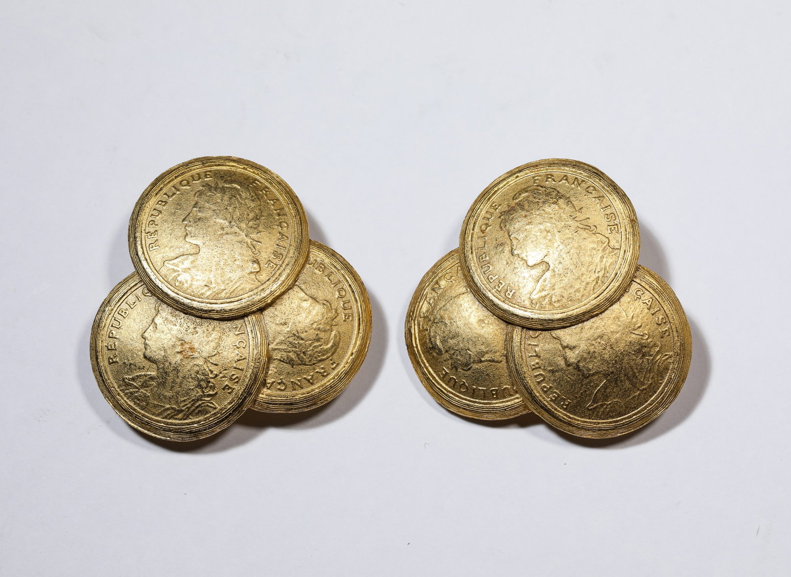 A Pair of 'Figural' Earrings: Dimensions: Weight: 41 g. Width: 4.2 cm. All measurements are approximate.