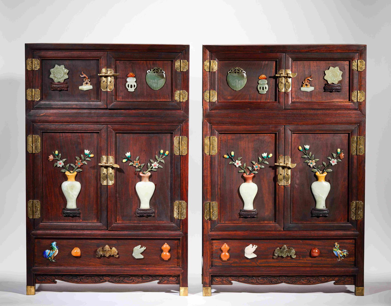 A Pair of Zitan, Jade and 'Hundred Treasures'-Inlaid Cabinets: Dimensions: Length: 45 cm x Width: 20 cm x Height: 70 cm. All measurements are approximate.