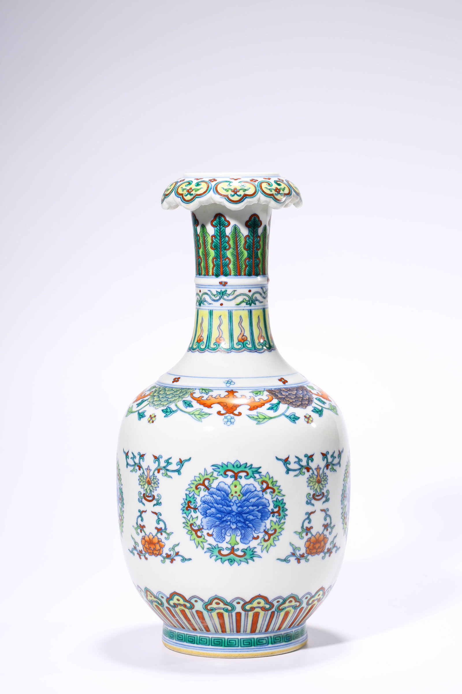 A Doucai 'Bat, Shou and Florals' 'Cloud-Mouth' Vase: Dimensions: Width: 15.1 cm x Height: 30.6 cm. All measurements are approximate.