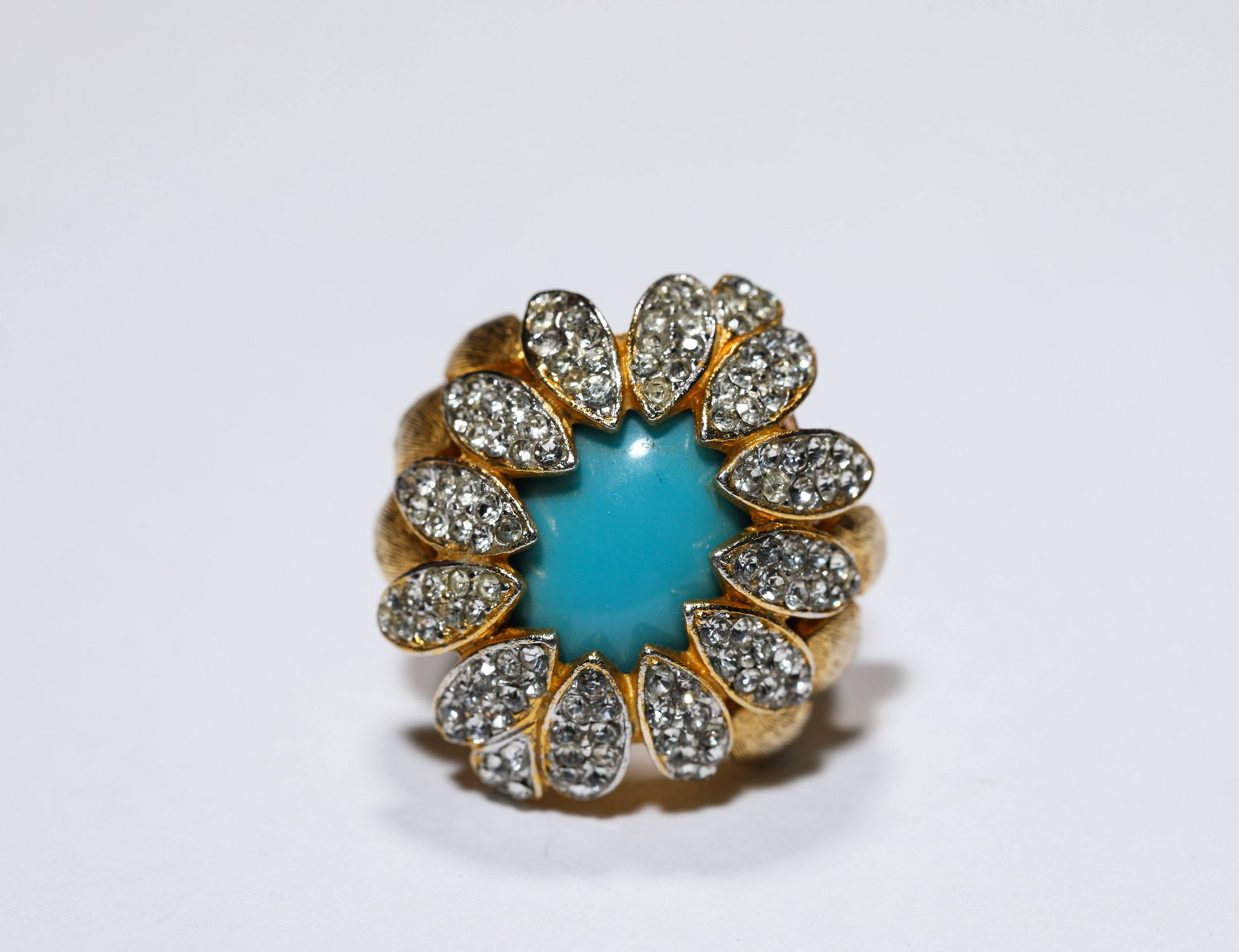 A Ring: Dimensions: Weight: 15 g. Length: 2.7 cm x Width: 2.4 cm x Height: 2.6 cm. All measurements are approximate.