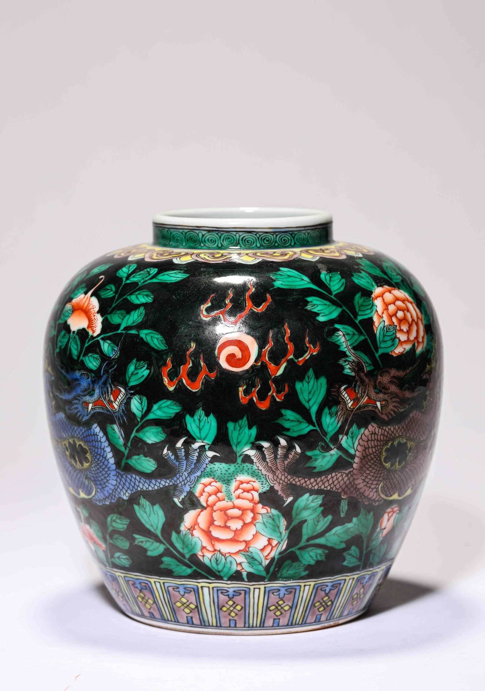 A Black-Glazed Wucai 'Dragon Chasing a Pearl' Jar: Dimensions: Width: 17.1 cm x Height: 17.2 cm. All measurements are approximate.