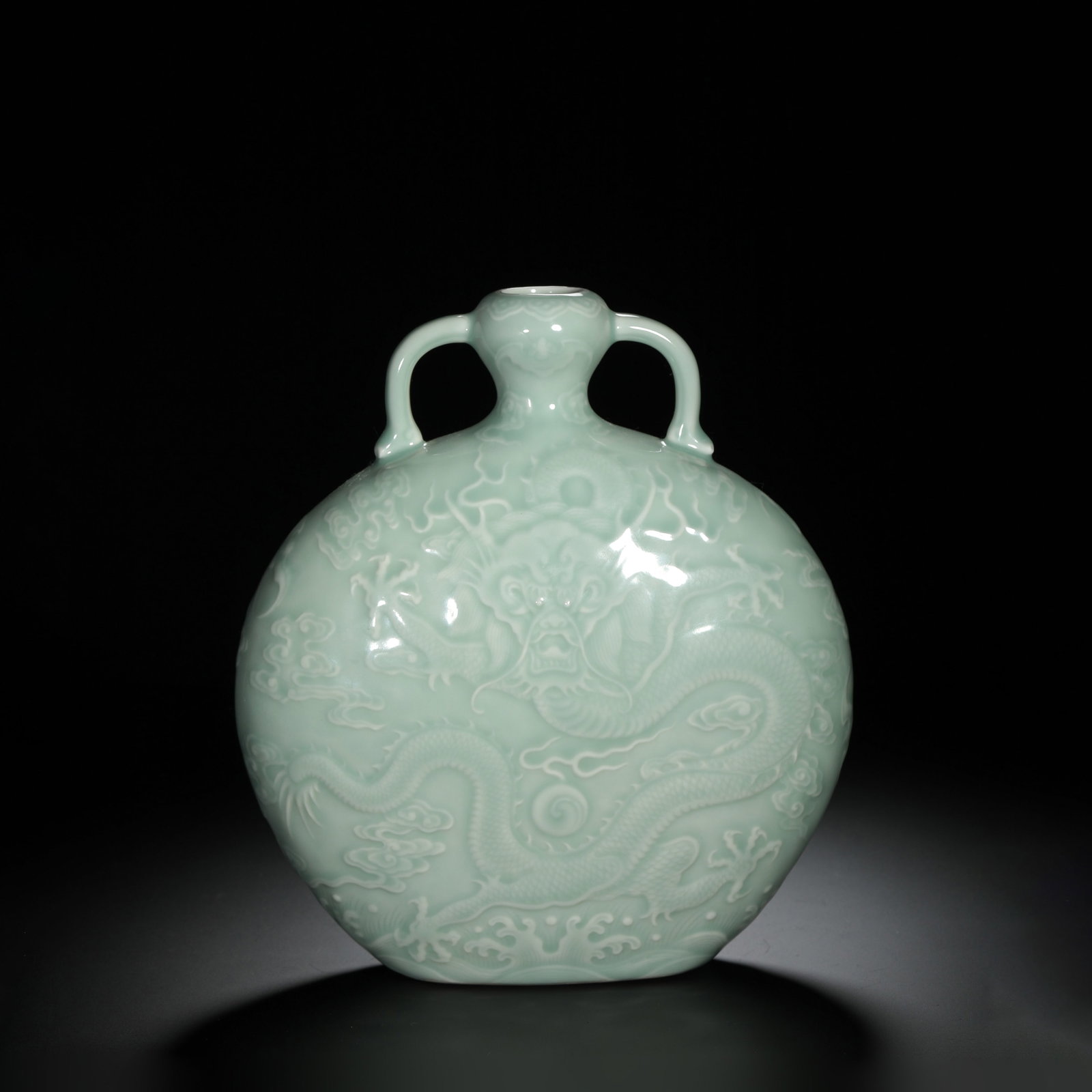 Celadon Glazed Incised Dragon Moonflask: Celadon Glazed Incised Dragon Moonflask Length:19cm Width:7.4cm Height:21.5cm