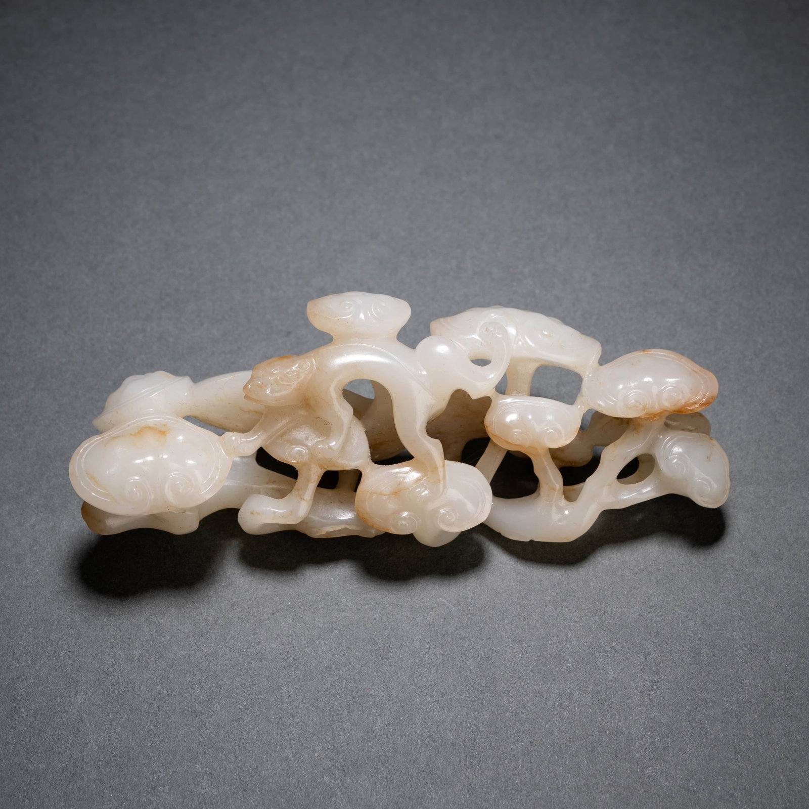 Carved Jade Lingzhi Brush Rack: Carved Jade Lingzhi Brush Rack Length:10cm, Height:3.5cm,
