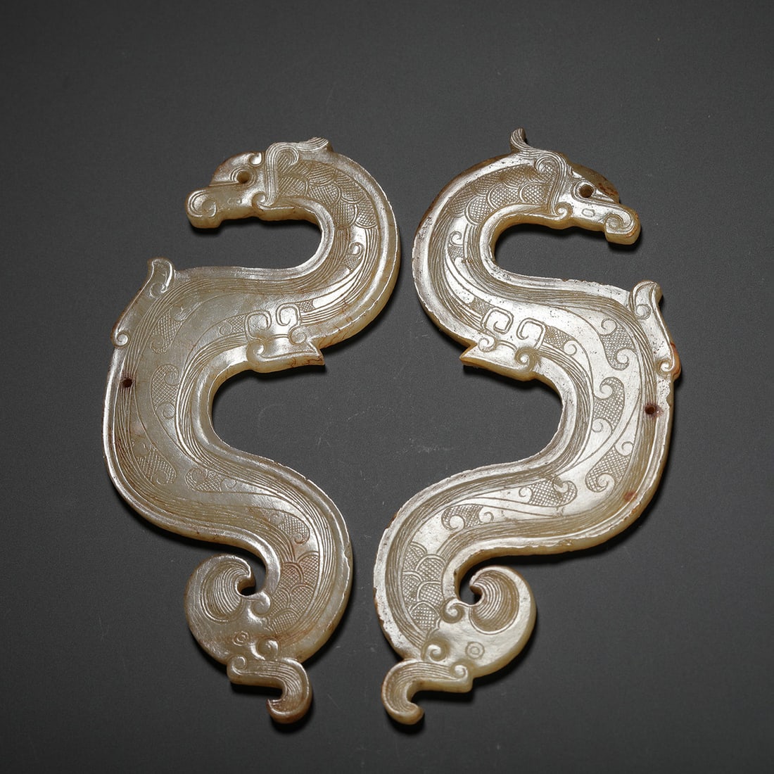 Pair of Carved Jade Dragon Plaques: Pair of Carved Jade Dragon Plaques Length:11cm Width:4.2cm