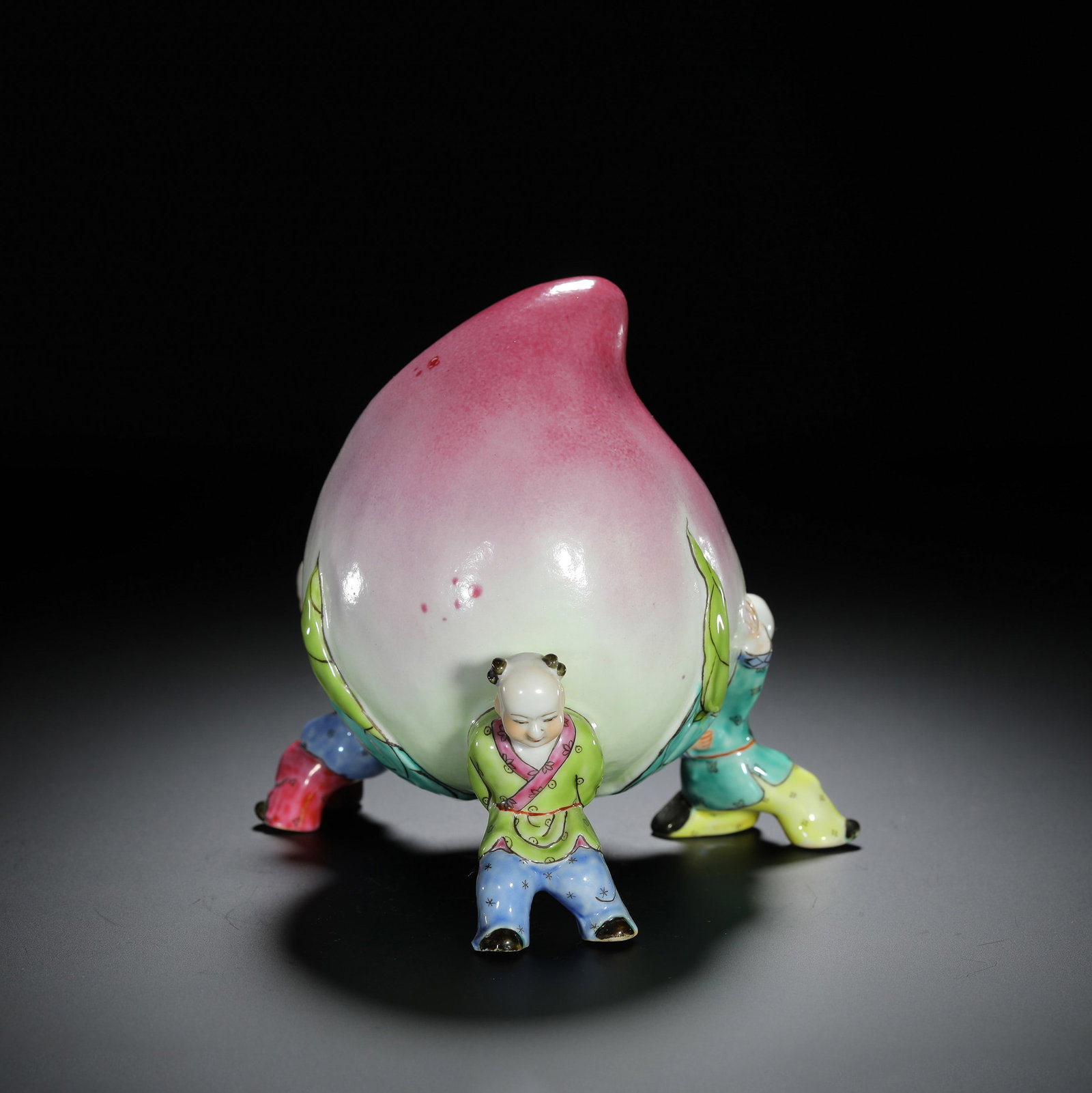 Famille-Rose Child Presenting Longevity Ornament: Famille-Rose Child Presenting Longevity Ornament Length:13cm Height:12cm