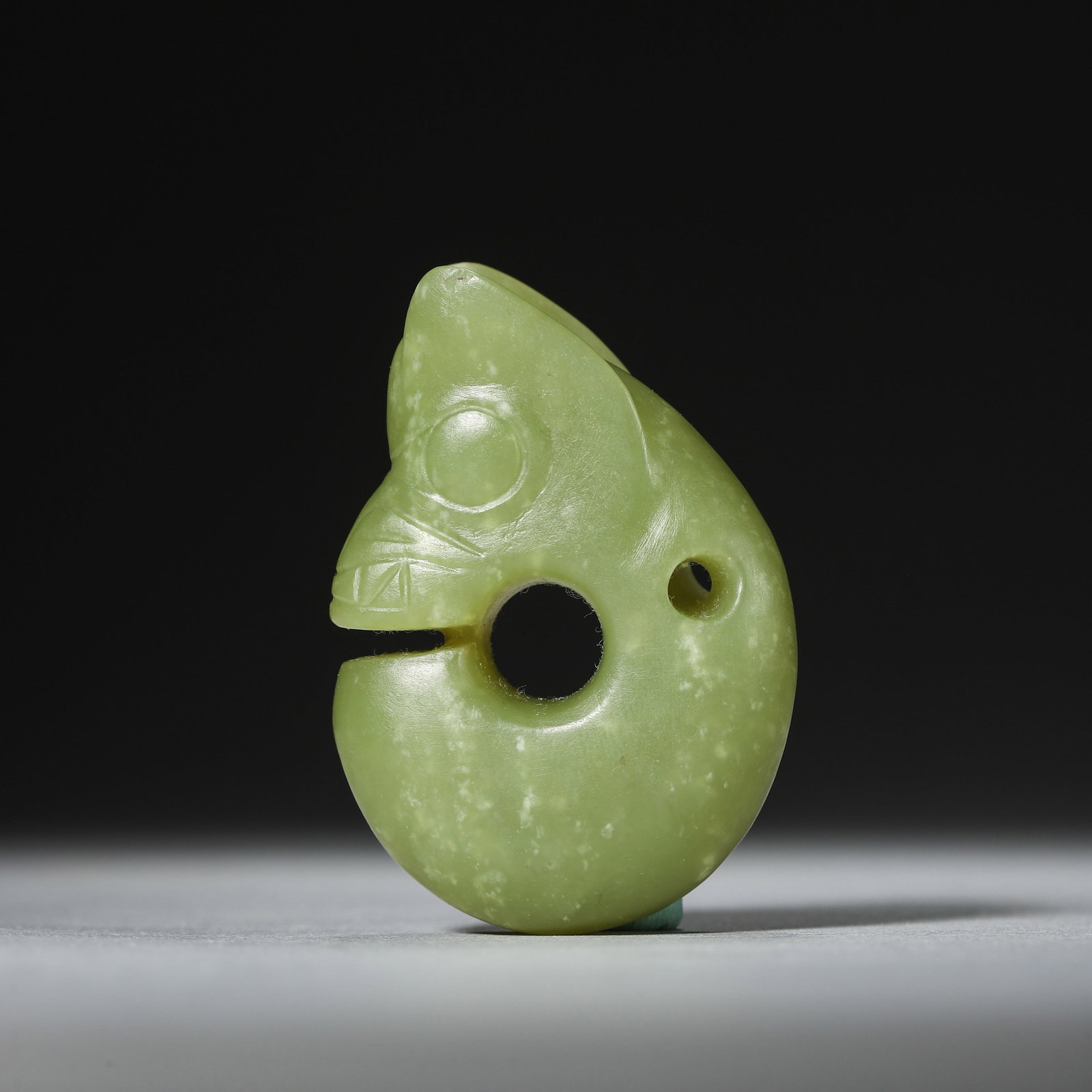 A Jade Pig Dragon: A Jade Pig Dragon Length:3.6cm Width:1.6cm Height:5.2cm