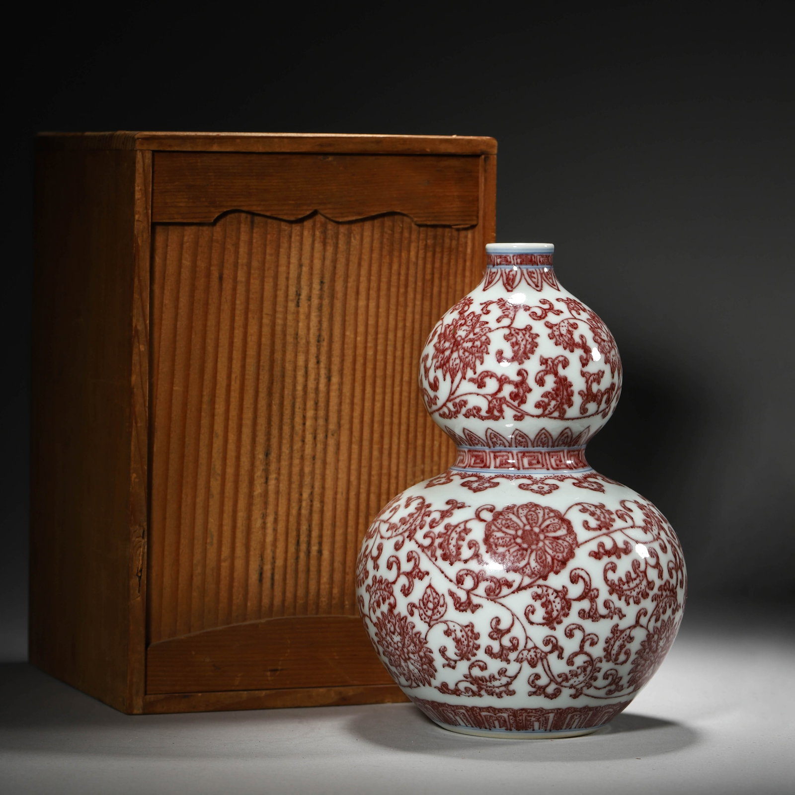Red under glazed double-gourd shaped vase: Red under glazed double-gourd shaped vase Diam.12.5cm Height:18.5cm