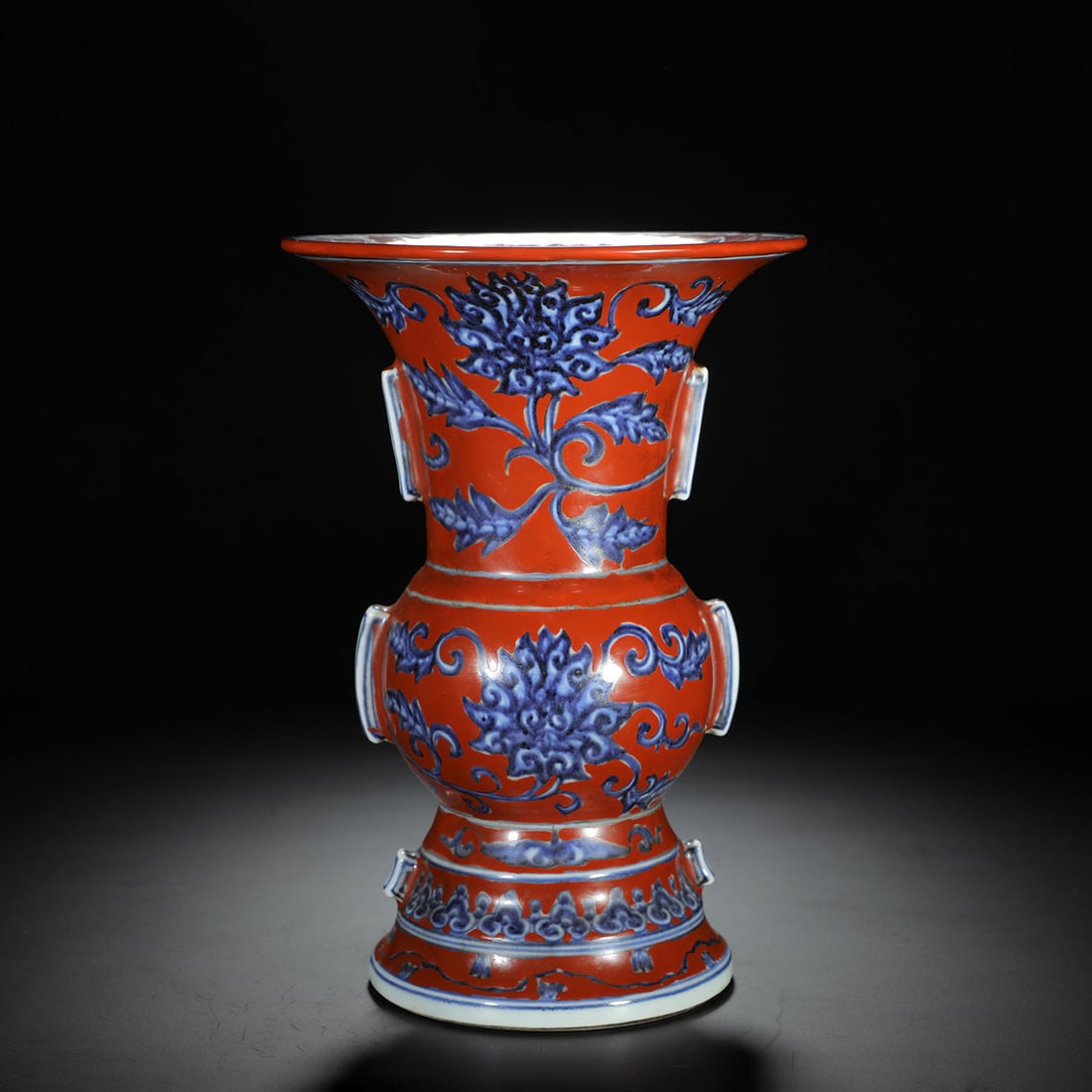 Red-Ground Blue and White Interlocking Lotus Gu Vase: Red-Ground Blue and White Interlocking Lotus Gu Vase Length:15m Height:22cm