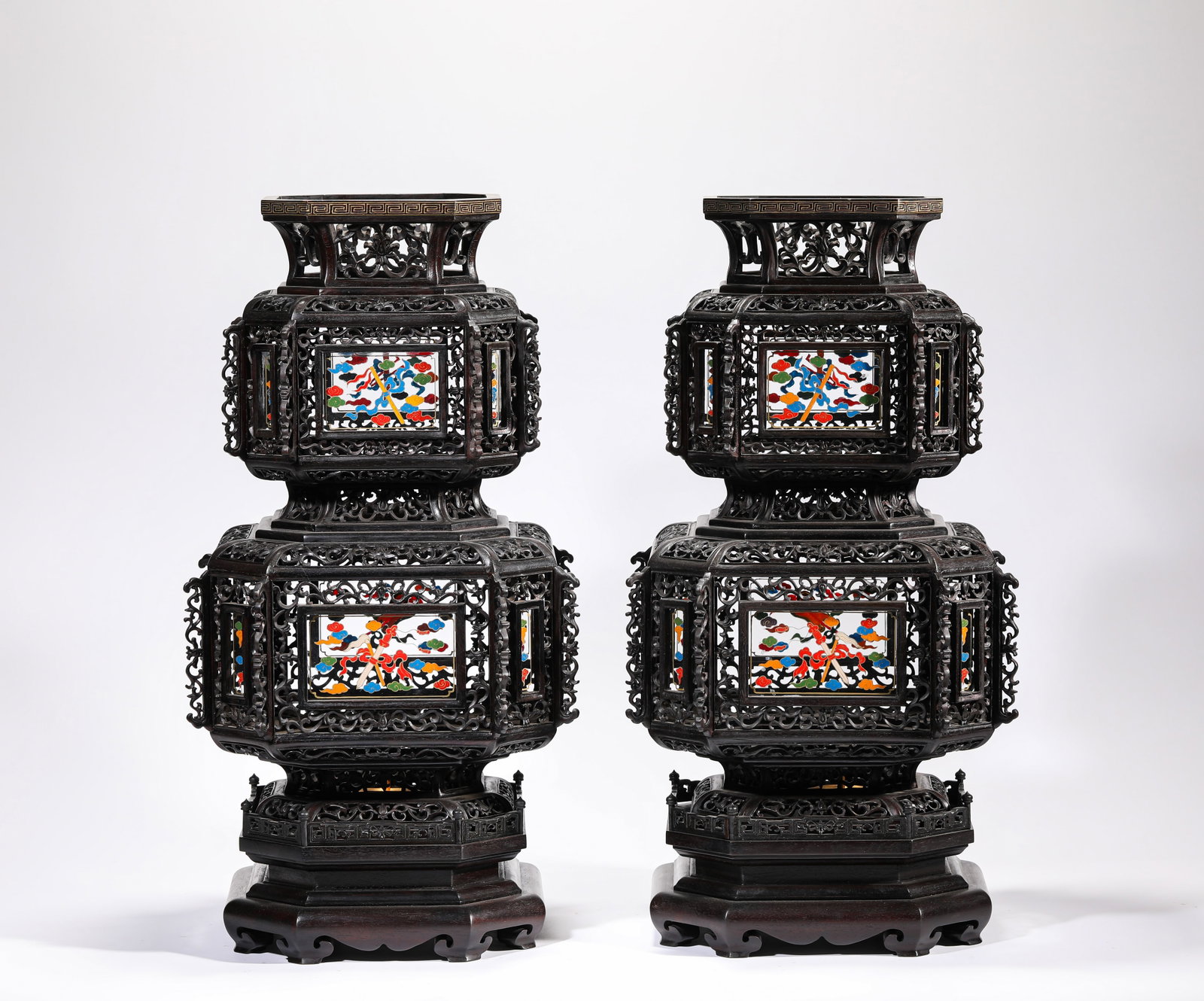 A PAIR OF ZITAN ?EIGHT BUDDHIST EMBLEMS? LAMPS (1 of 5)