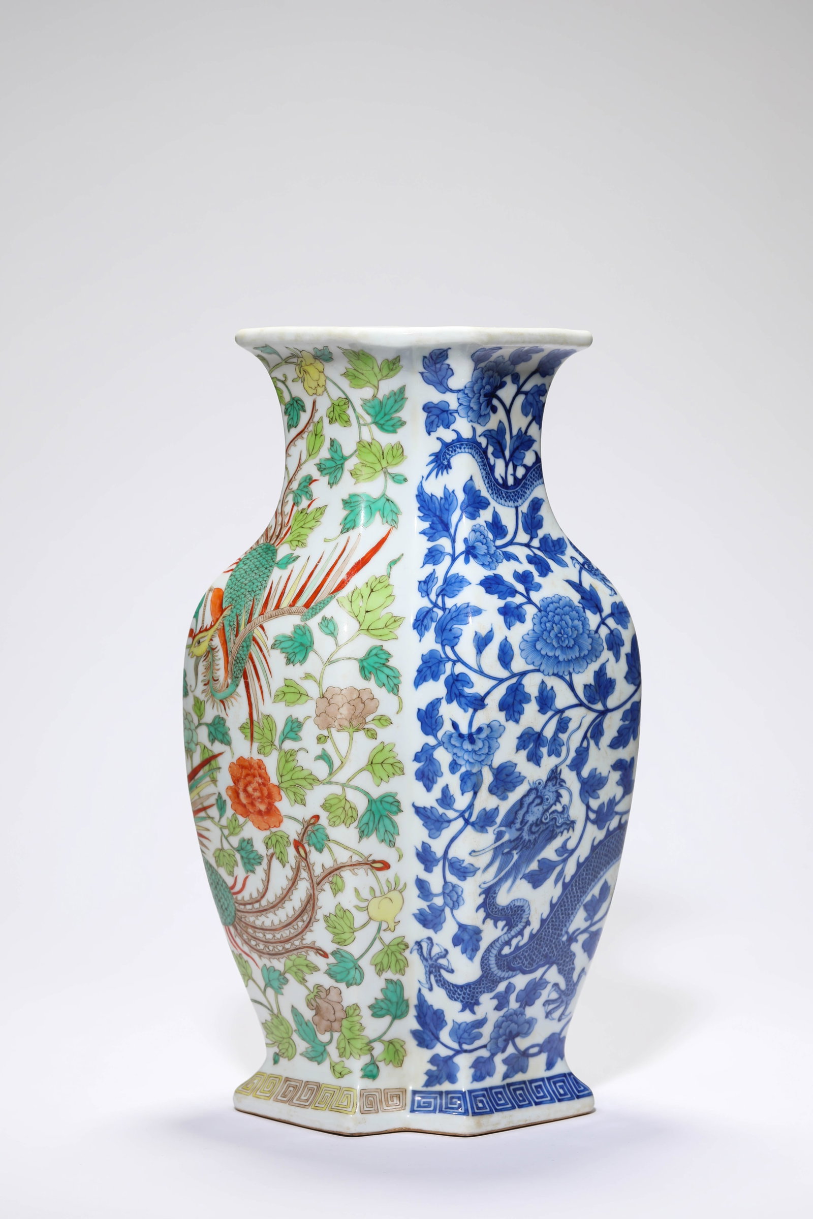 A BLUE AND WHITE AND FAMILLE-ROSE ?DRAGON AND PHOENIX? TWIN VASES: A BLUE AND WHITE AND FAMILLE-ROSE ?DRAGON AND PHOENIX? TWIN VASES Description: Dimensions: Length: 17.9 cm x Width: 13.5 cm x Height: 31 cm. All measurements are approximate.