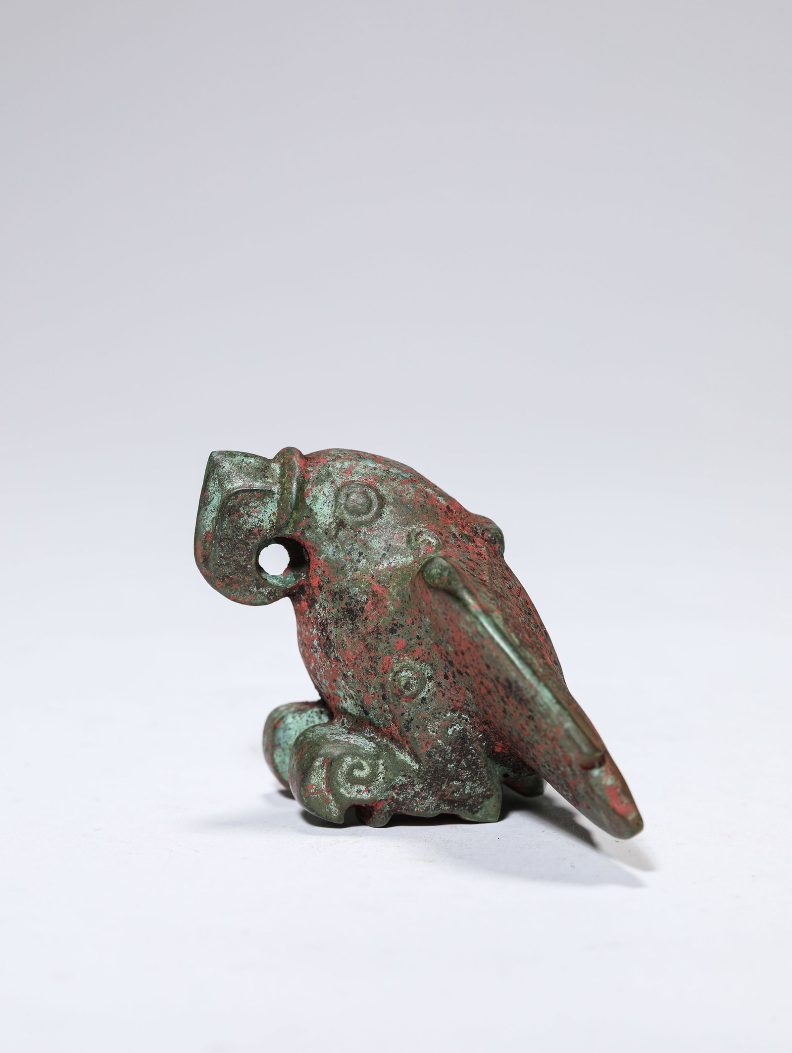 A JADE OWL: A JADE OWL Description: Dimensions: Length: 9.3 cm x Width: 6.2 cm x Height: 3.9 cm. All measurements are approximate.