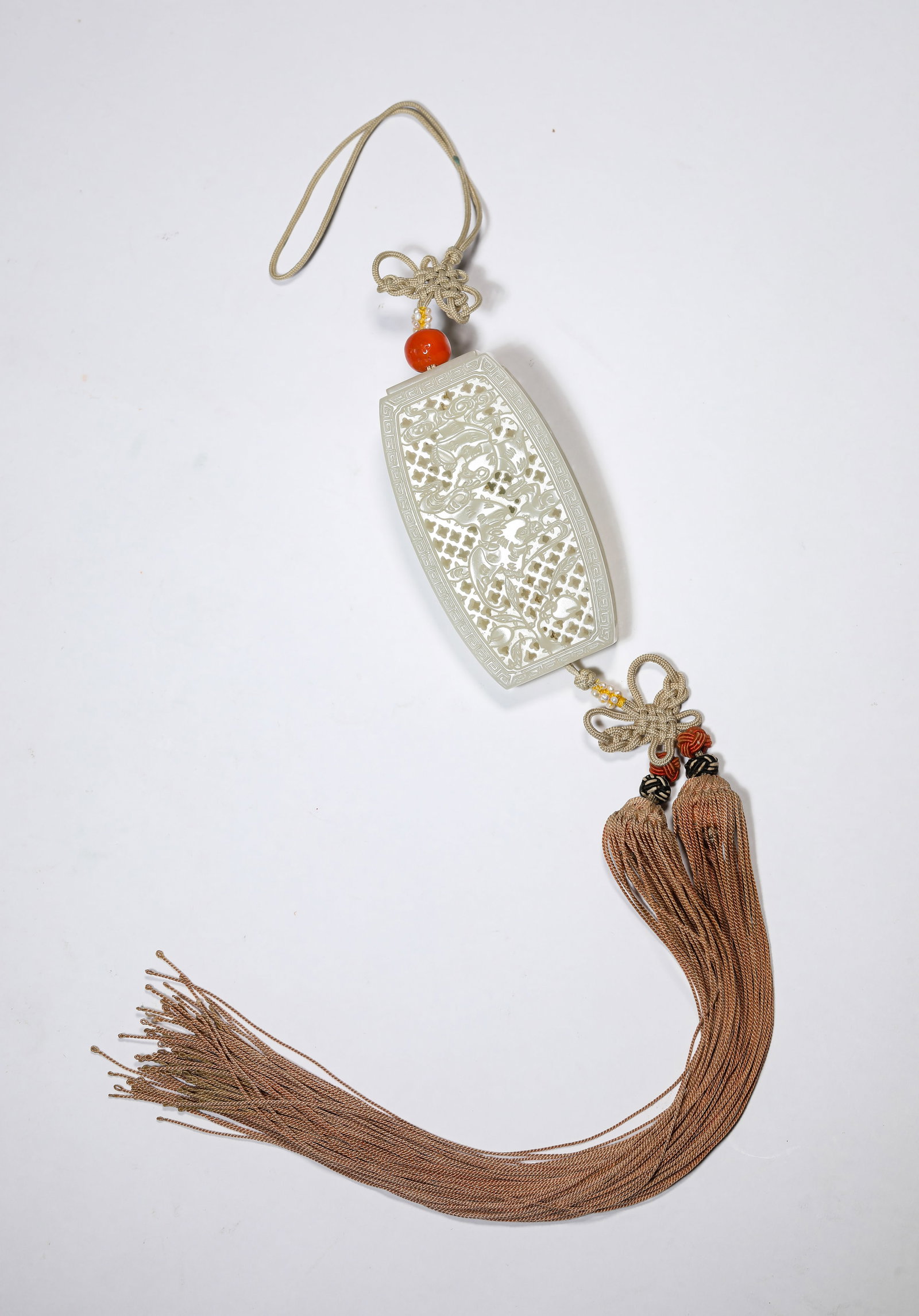 A JADE ?OPENWORK BAT? SACHET: A JADE ?OPENWORK BAT? SACHET Description: Dimensions: Width: 3.8 cm x Height: 7.1 cm. All measurements are approximate.