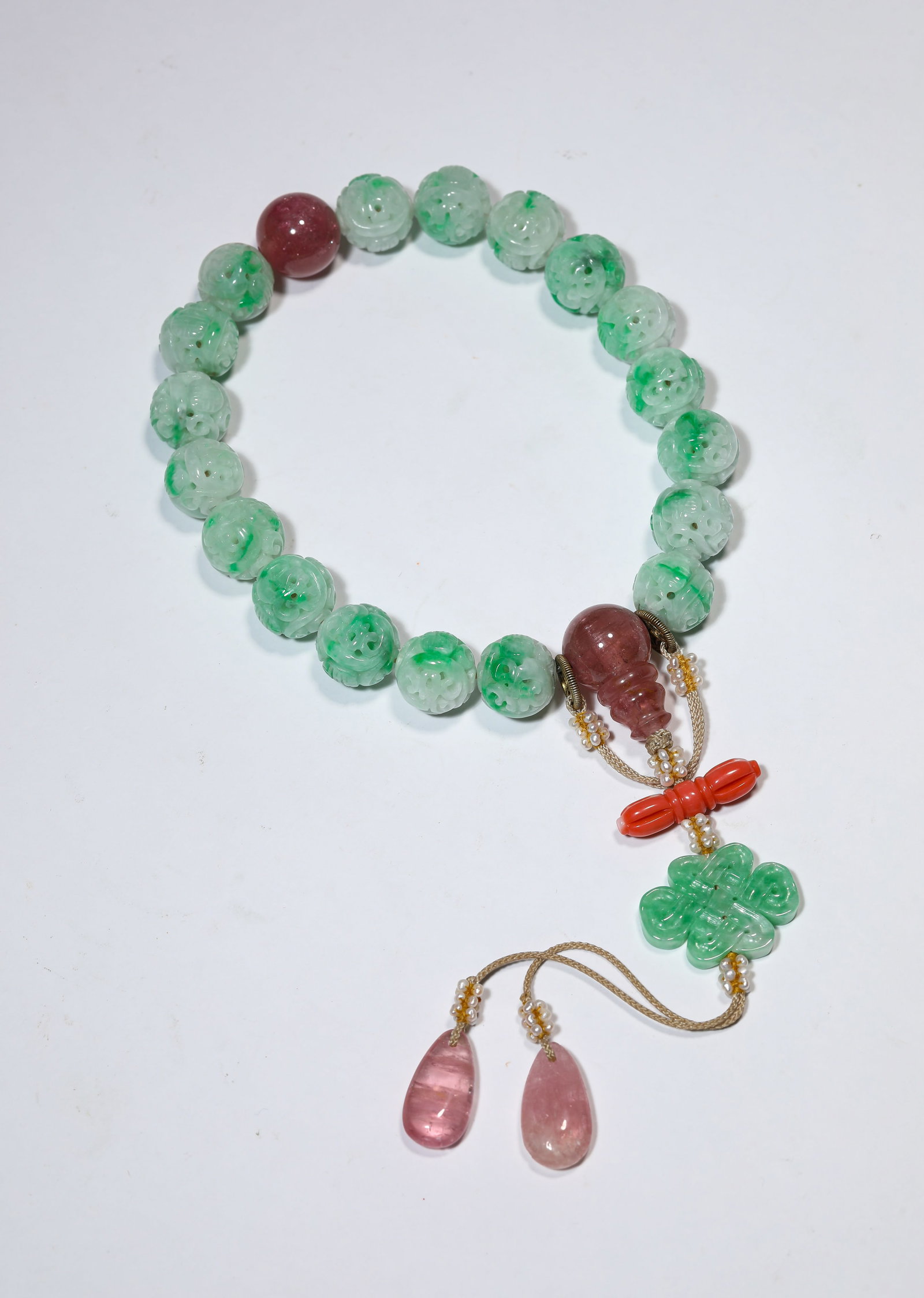 A JADEITE ?EIGHTEEN-BEAD? BRACELET: A JADEITE ?EIGHTEEN-BEAD? BRACELET Description: Dimensions: Width: 1.3 cm. All measurements are approximate.