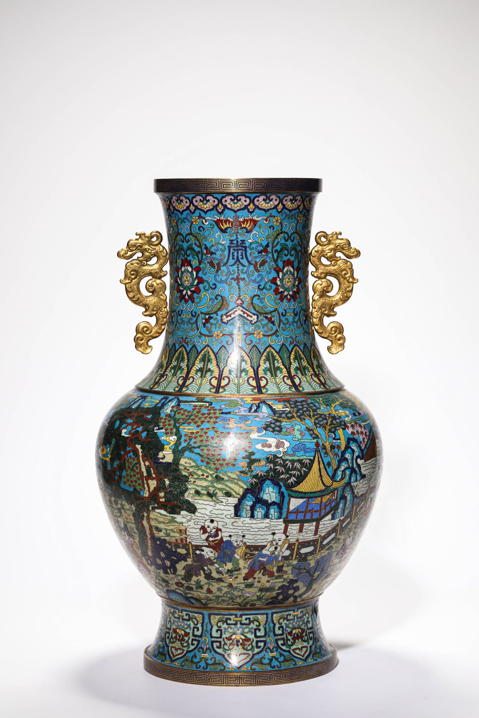 A CLOISONN‚ ENAMEL ?CHILDREN AT PLAY? VASE: A CLOISONN‚ ENAMEL ?CHILDREN AT PLAY? VASE Description: Dimensions: Weight: 6700 g. Width: 29.8 cm x Height: 50.5 cm. All measurements are approximate.
