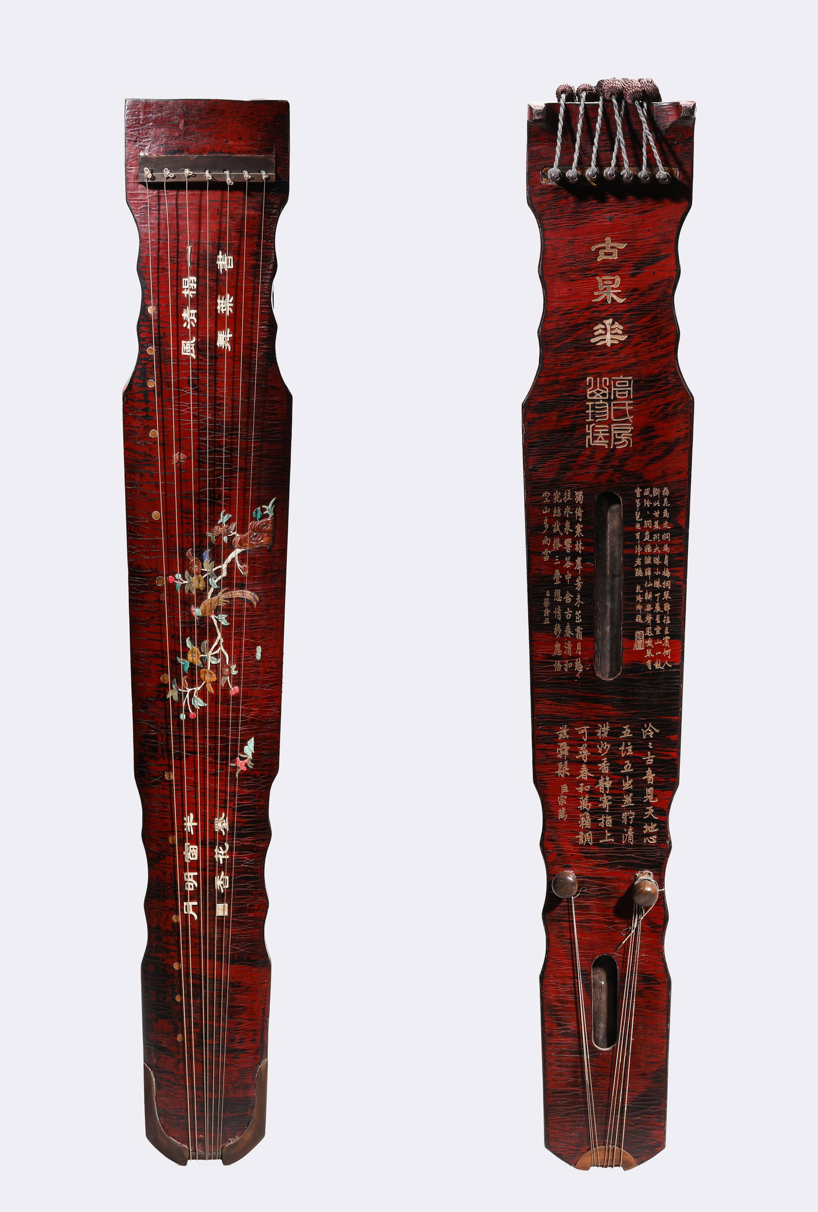 A WOOD AND ?HUNDRED TREASURES?-INLAID ?FLOWERS, BIRDS AND POEM? QIN: A WOOD AND ?HUNDRED TREASURES?-INLAID ?FLOWERS, BIRDS AND POEM? QIN Description: Dimensions: Length: 121.5 cm x Width: 18.5 cm x Height: 10 cm. All measurements are approximate.