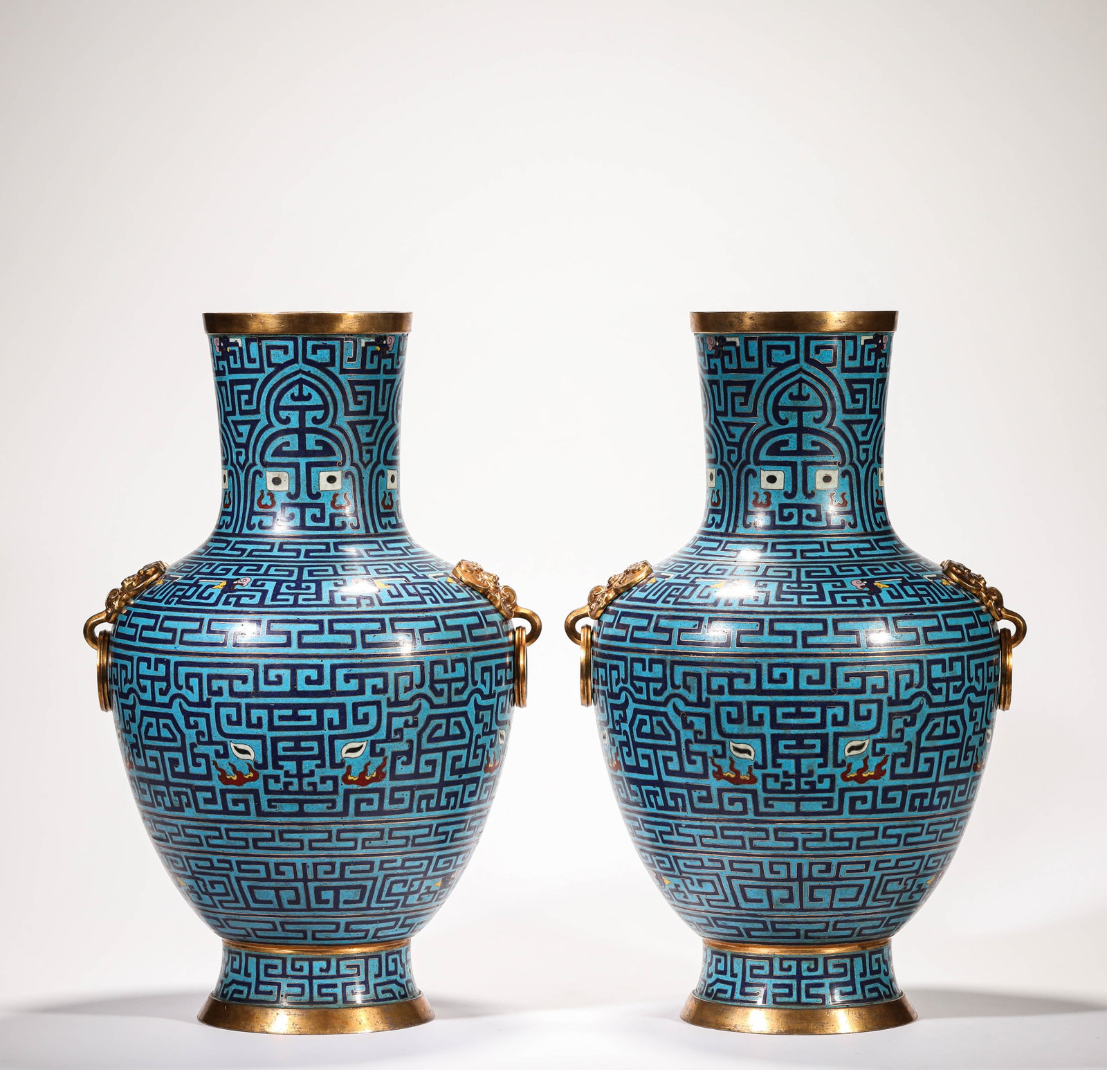 A PAIR OF CLOISONN‚ ENAMEL ?ANIMAL MASK? VASES: A PAIR OF CLOISONN‚ ENAMEL ?ANIMAL MASK? VASES Description: Dimensions: Weight: 11400 g. Width: 26.2 cm x Height: 45.8 cm. All measurements are approximate.