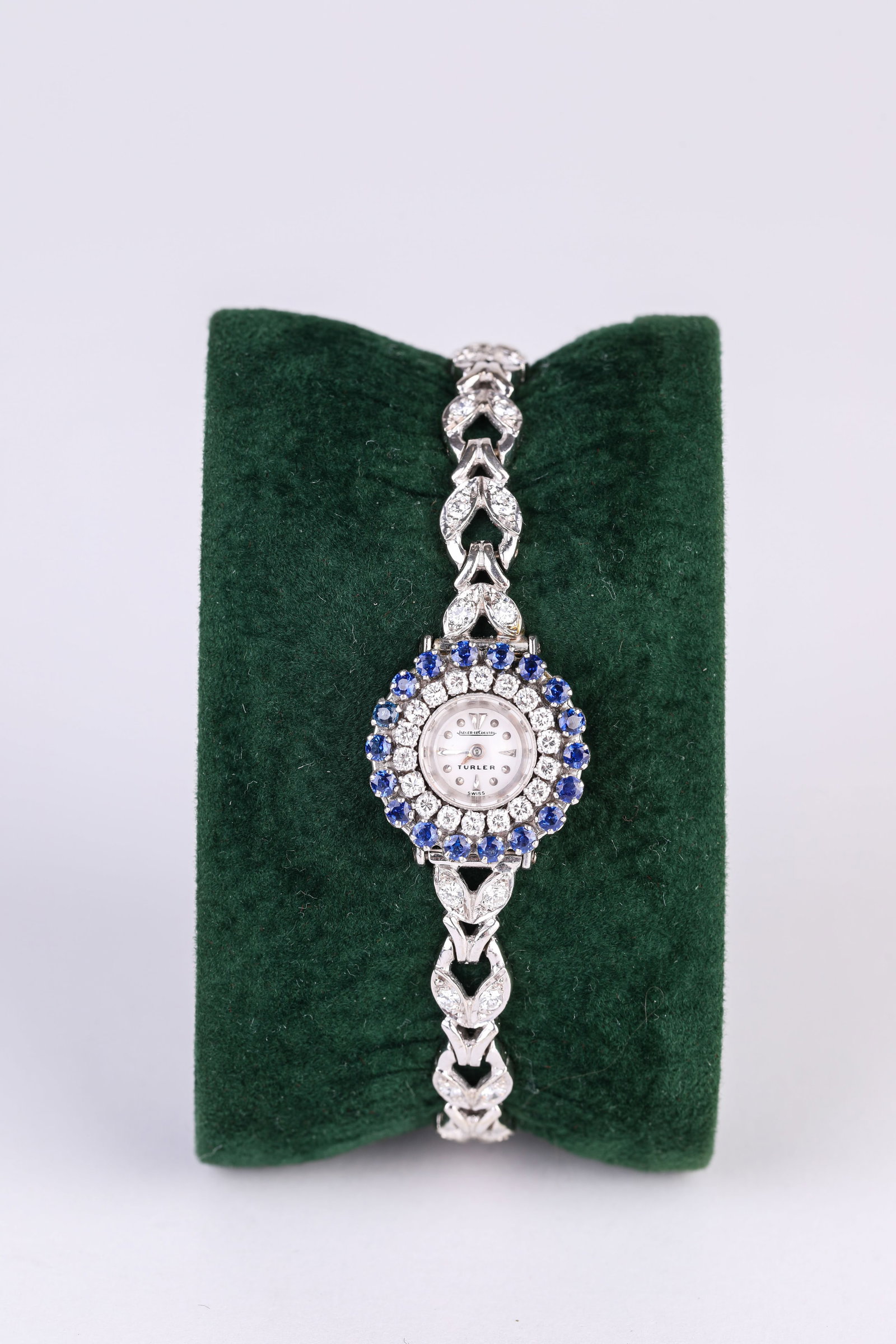 A JAEGER-LECOULTRE SAPPHIRE AND DIAMOND WRISTWATCH: A JAEGER-LECOULTRE SAPPHIRE AND DIAMOND WRISTWATCH Description: Dimensions: Width: 19 mm. All measurements are approximate.