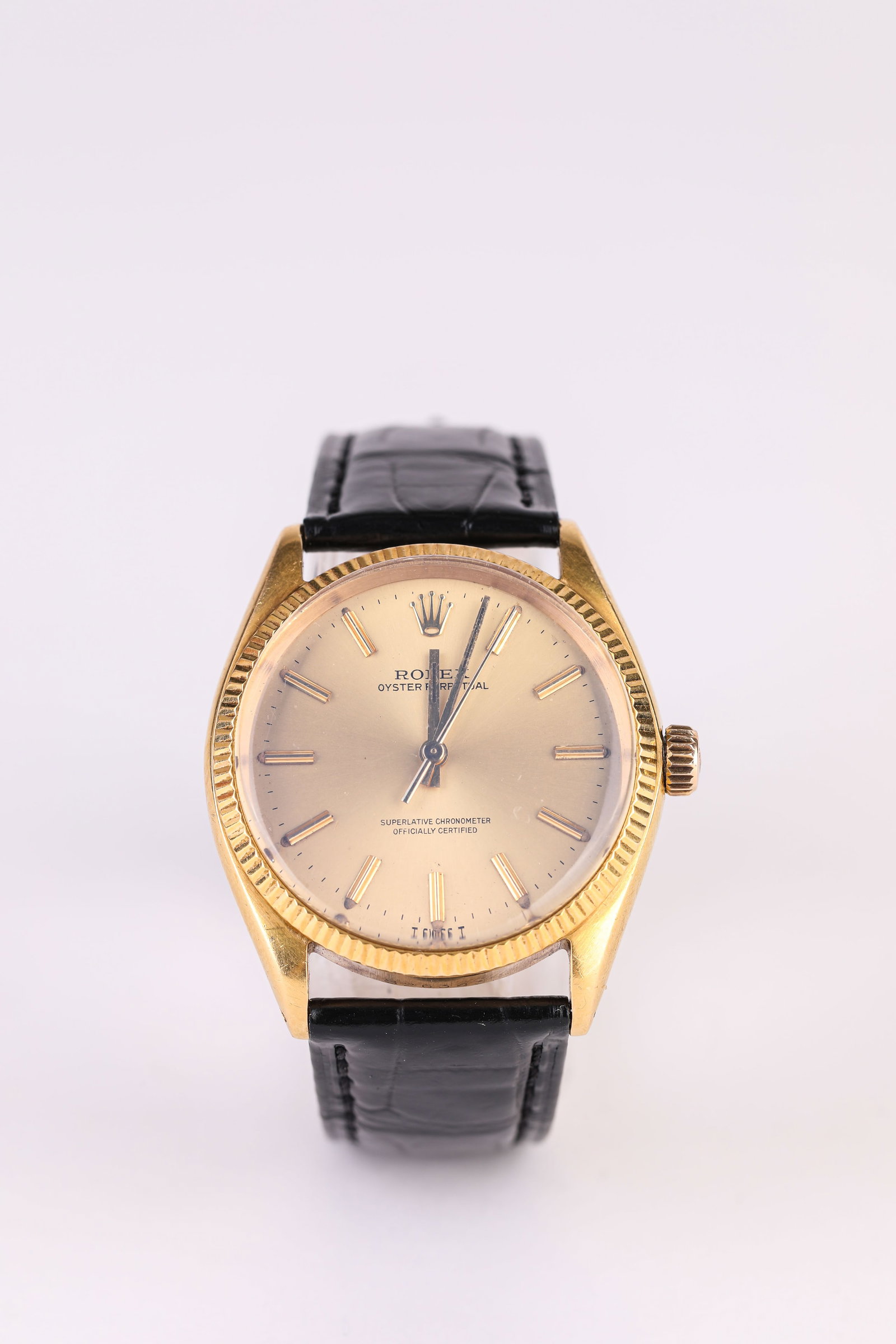 A ROLEX GOLD WRISTWATCH: A ROLEX GOLD WRISTWATCH Description: Dimensions: Width: 36 mm. All measurements are approximate.