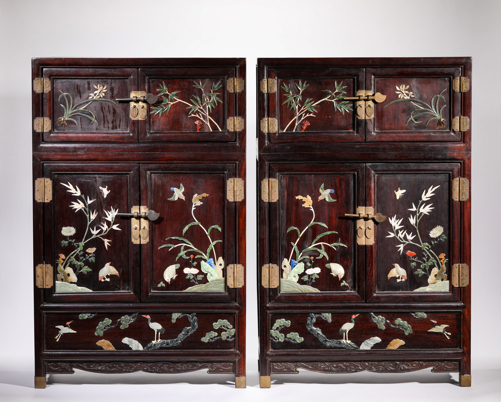 A PAIR OF ZITAN AND ?HUNDRED TREASURES?-INLAID ?FLOWERS AND BIRDS? SMALL CABINETS: A PAIR OF ZITAN AND ?HUNDRED TREASURES?-INLAID ?FLOWERS AND BIRDS? SMALL CABINETS Description: Dimensions: Length: 45 cm x Width: 20 cm x Height: 70 cm. All measurements are approximate.