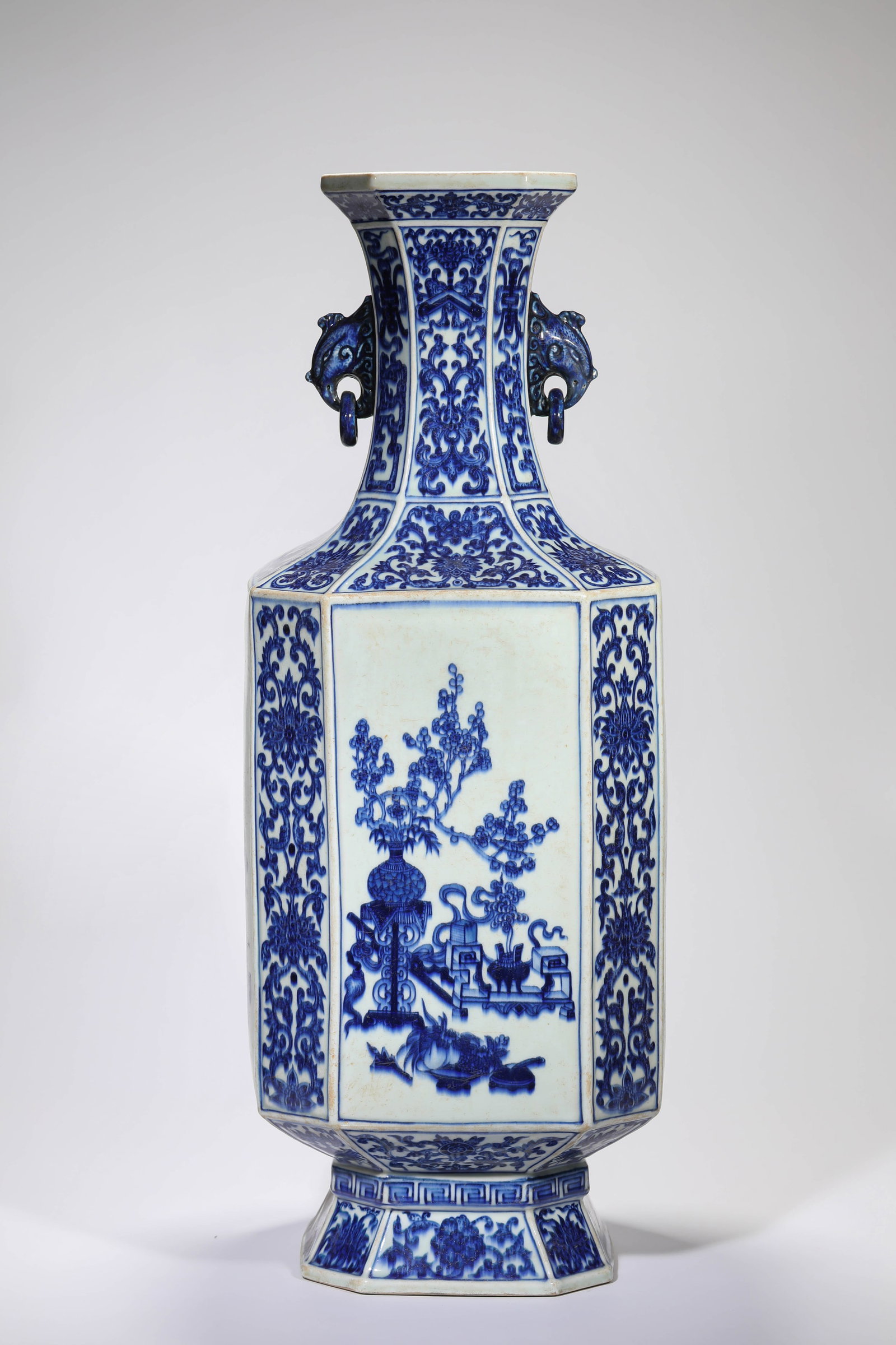 A BLUE AND WHITE ?BONSAI? ?DOUBLE ELEPHANT-HEAD RING HANDLES? ?OCTAGONAL? VASE: A BLUE AND WHITE ?BONSAI? ?DOUBLE ELEPHANT-HEAD RING HANDLES? ?OCTAGONAL? VASE Description: Dimensions: Length: 25 cm x Width: 25 cm x Height: 69 cm. All measurements are approximate.