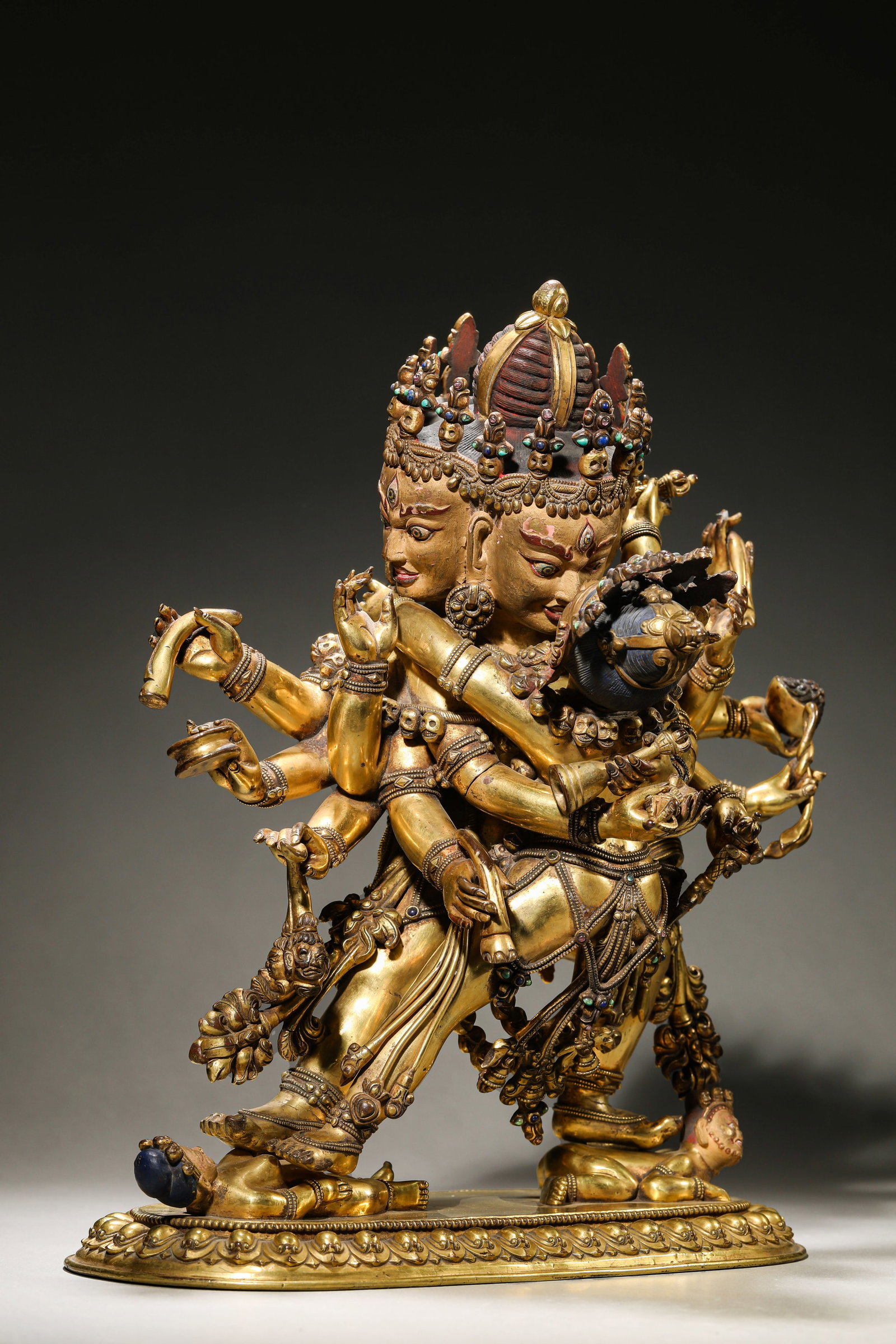 A ?TIBETAN DENSATIL MONASTERY-STYLE? FIGURE OF CHAKRASAMVARA: A ?TIBETAN DENSATIL MONASTERY-STYLE? FIGURE OF CHAKRASAMVARA Description: Dimensions: Weight: 9700 g. Length: 31.5 cm x Width: 20.8 cm x Height: 35 cm. All measurements are approximate.