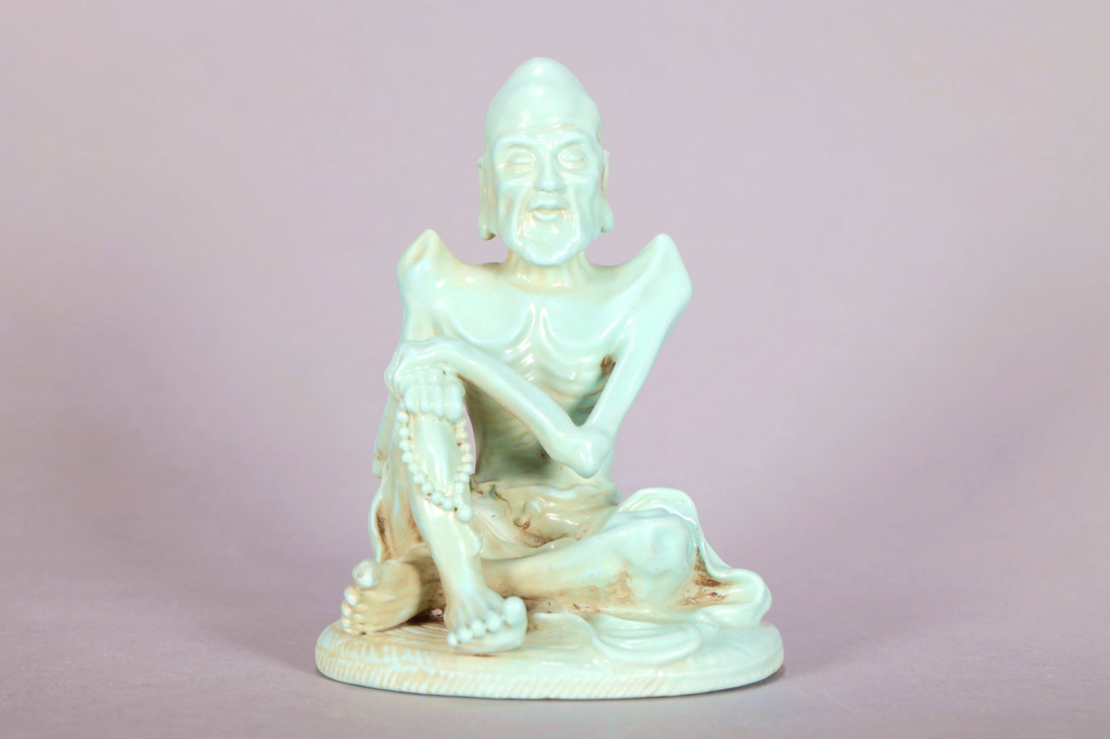 A GREEN-GLAZED EMACIATED LUOHAN FIGURE - 2