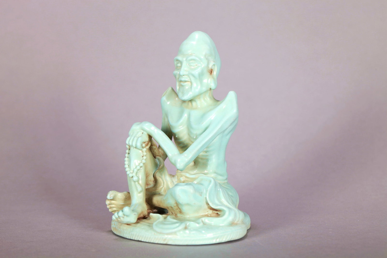 A GREEN-GLAZED EMACIATED LUOHAN FIGURE - 3