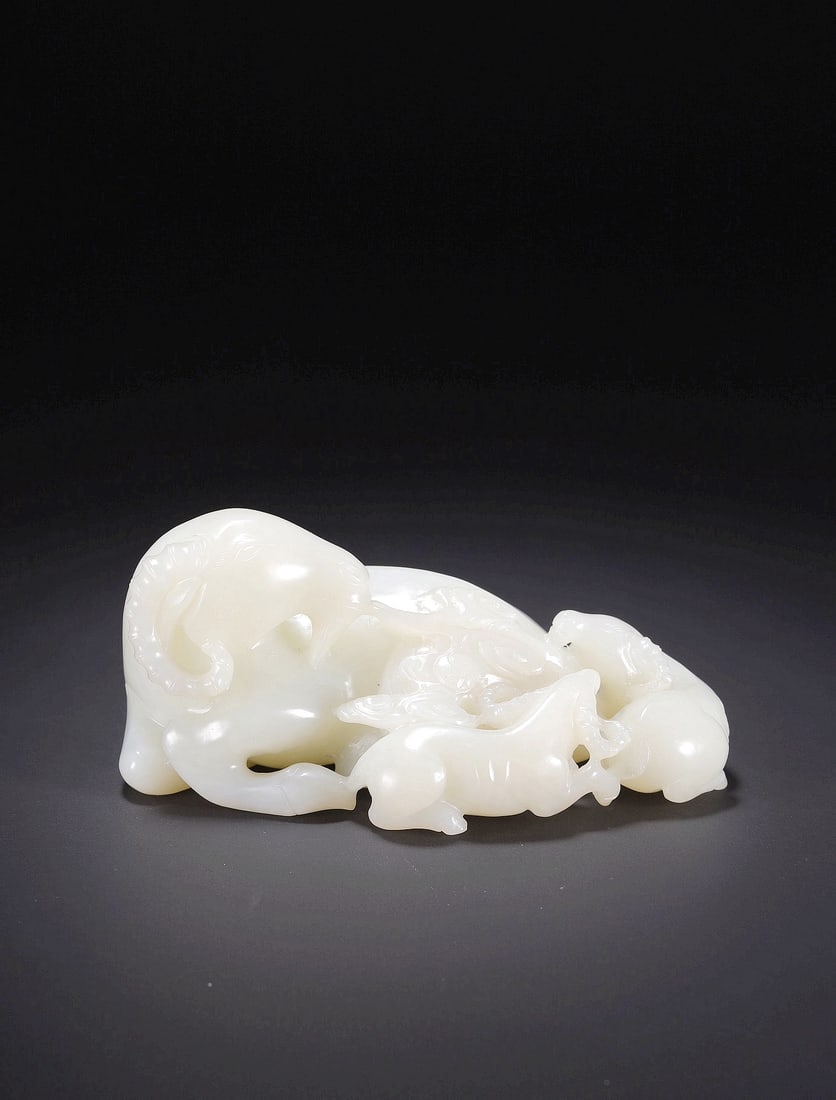A HETIAN JADE 'THREE RAMS' DISPLAY PIECE: A HETIAN JADE 'THREE RAMS' DISPLAY PIECE Size:10.7*6.5*5.0cm
