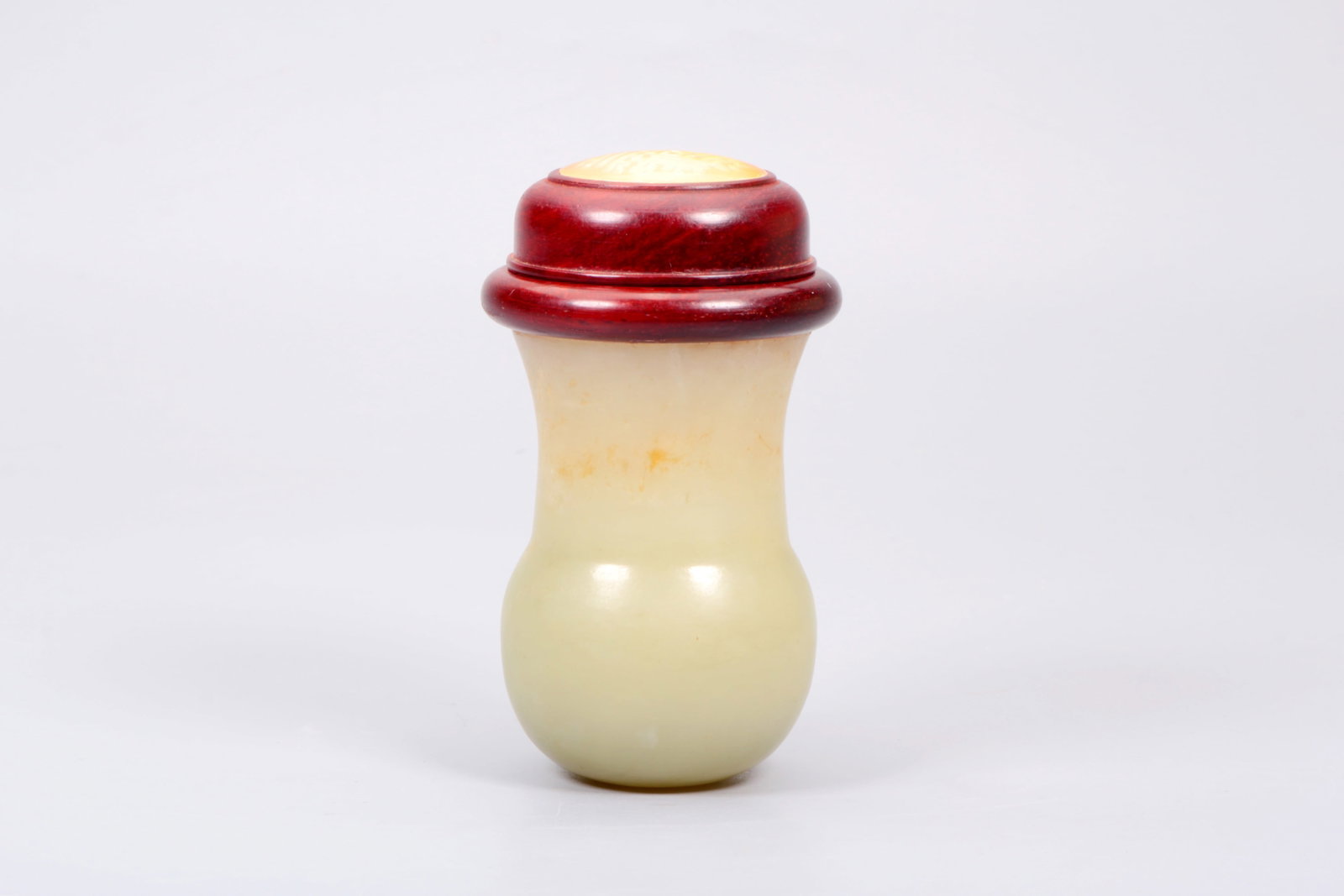 A HETIAN JADE INSECT-FORM GOURD: A HETIAN JADE INSECT-FORM GOURD Size:Height:10.9cm,Diam:6.2cm
