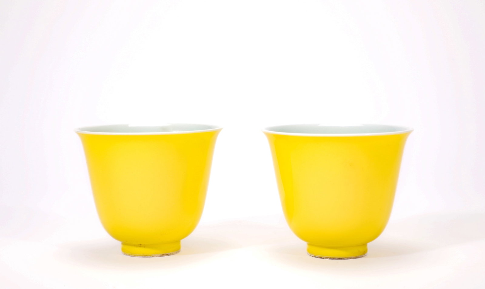 A PAIR YELLOW GLAZED CUPS - 2